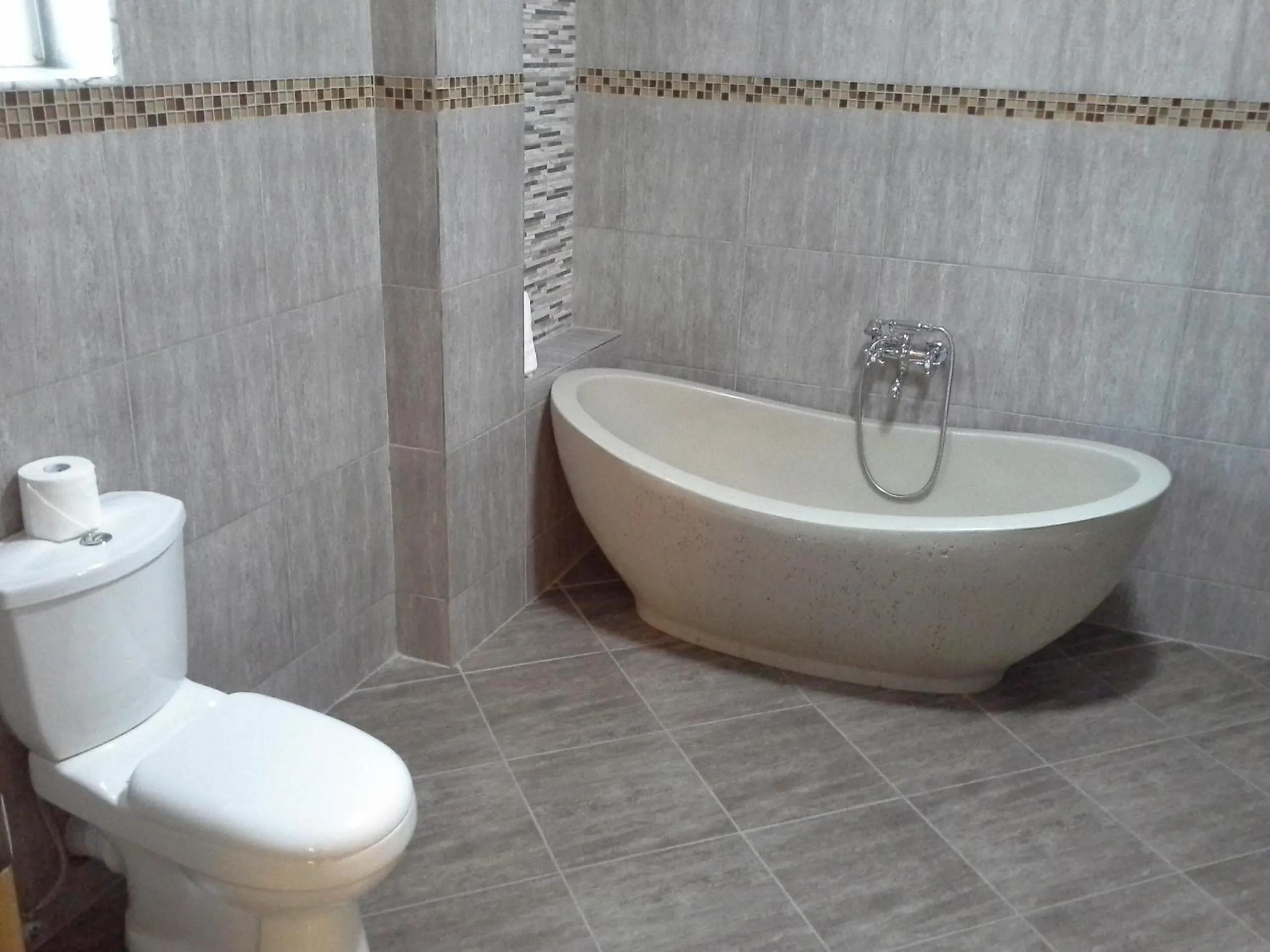 Bathroom in Tropical Enclave Hotel