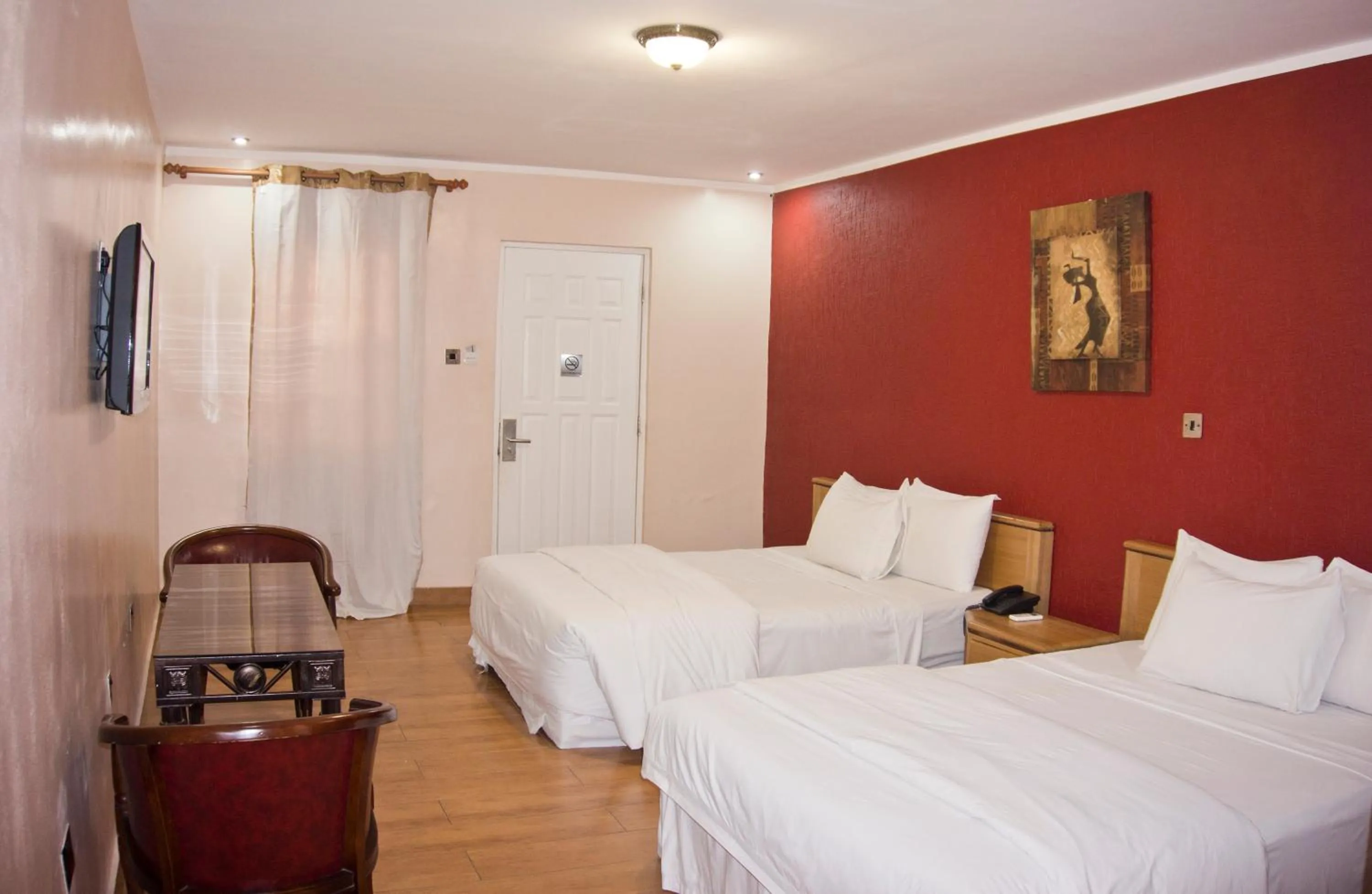 Bedroom, Bed in Tropical Enclave Hotel