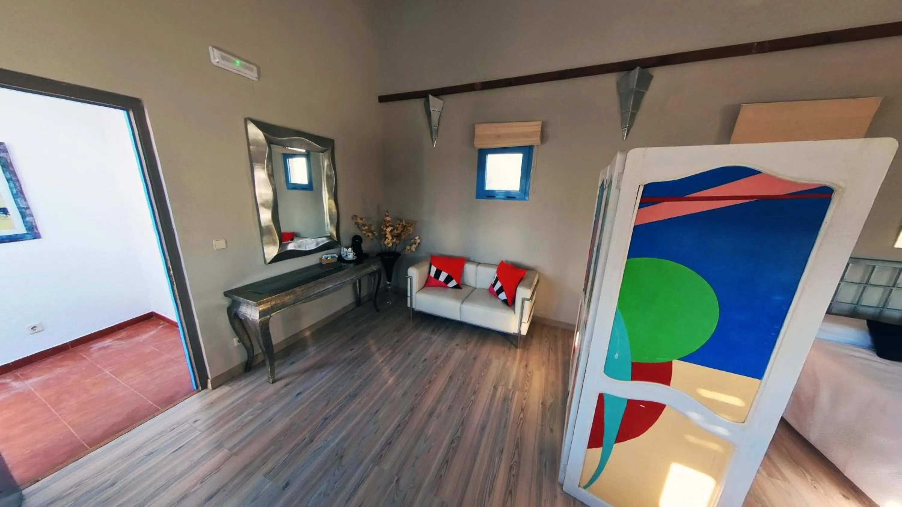 Living room, Bed in Hotel Utopía