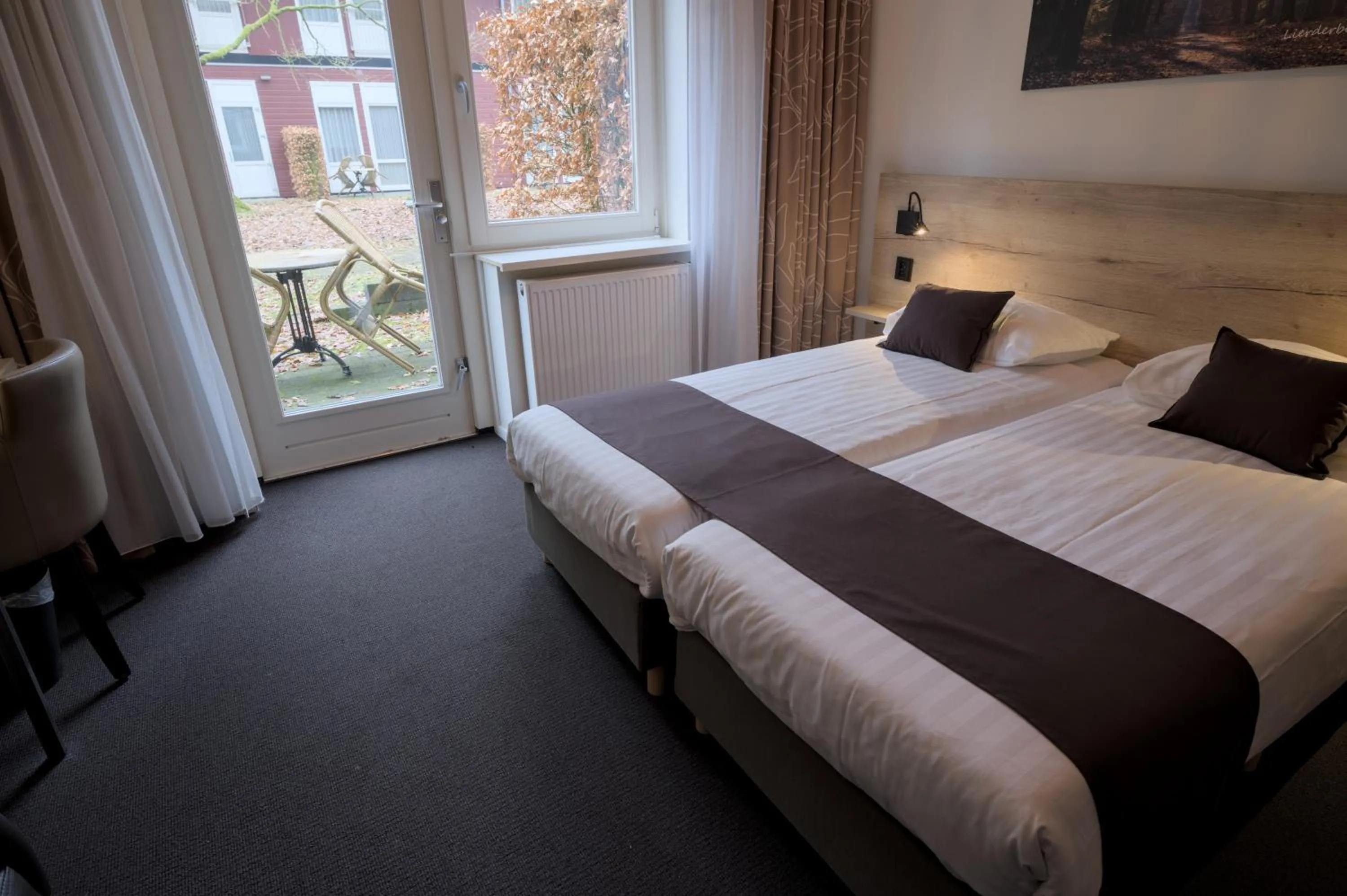 View (from property/room), Bed in Hotel de Stoppelberg