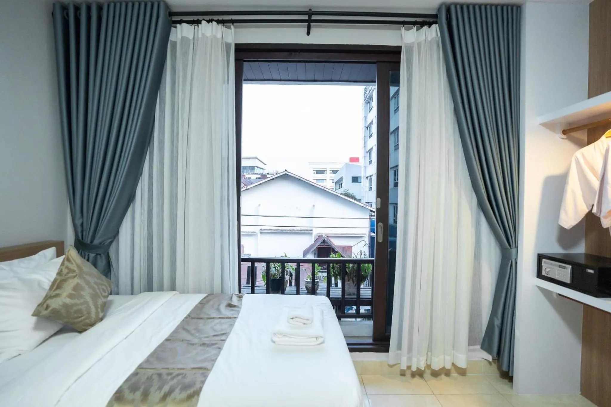 Bedroom in Vongkhamsene Boutique Hotel