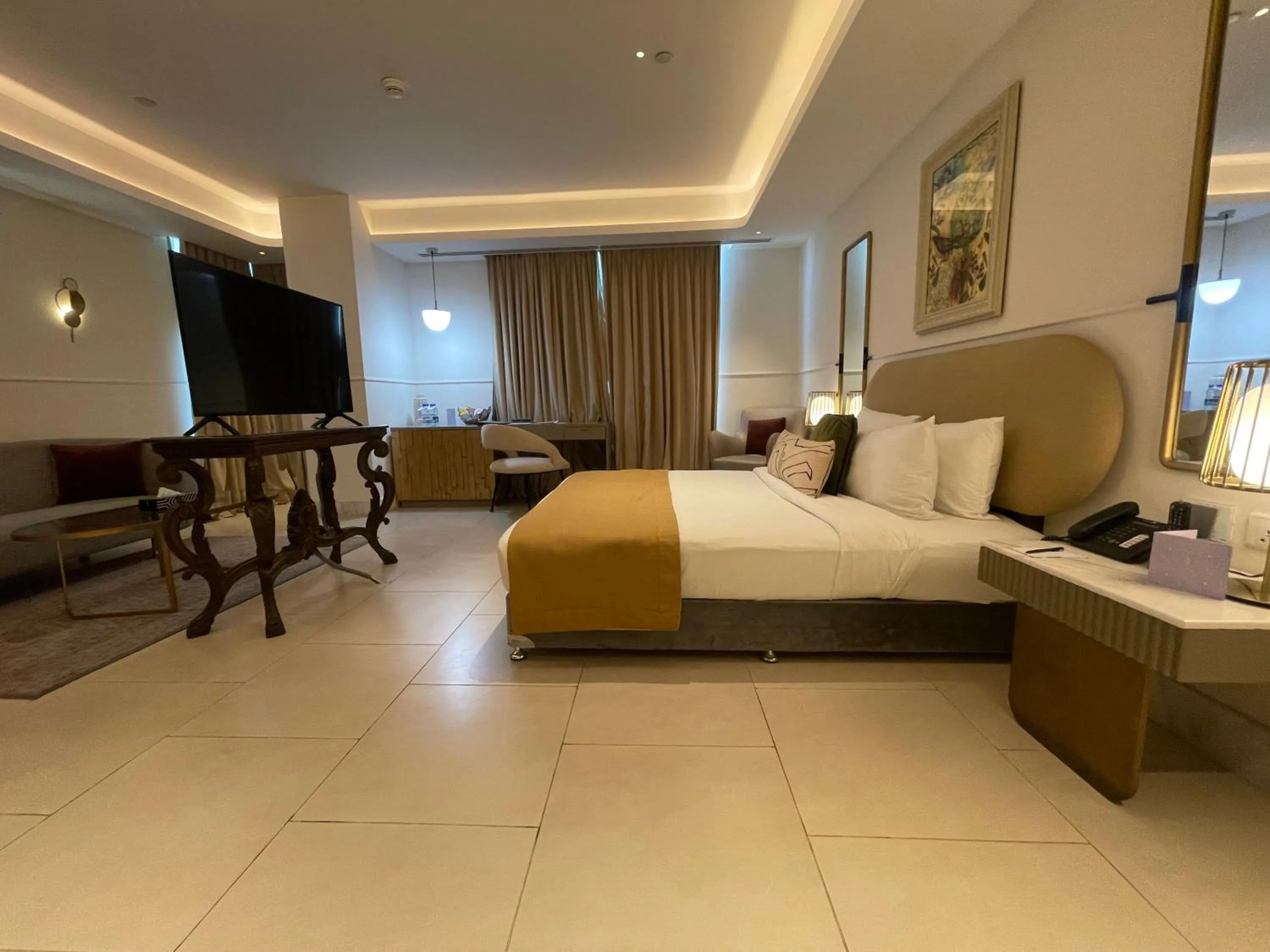 Bed in The Nishat Hotel