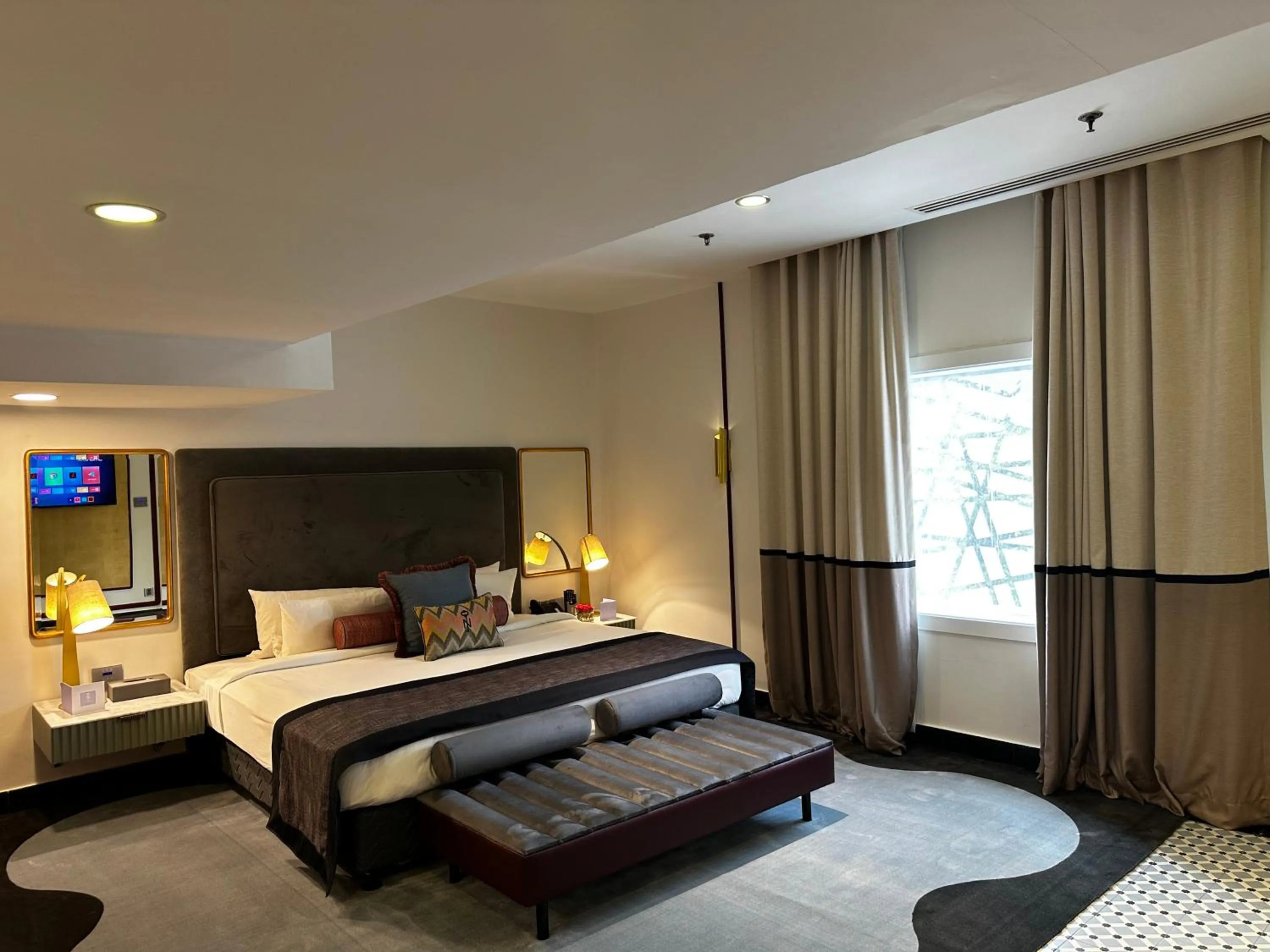 Bed in The Nishat Hotel