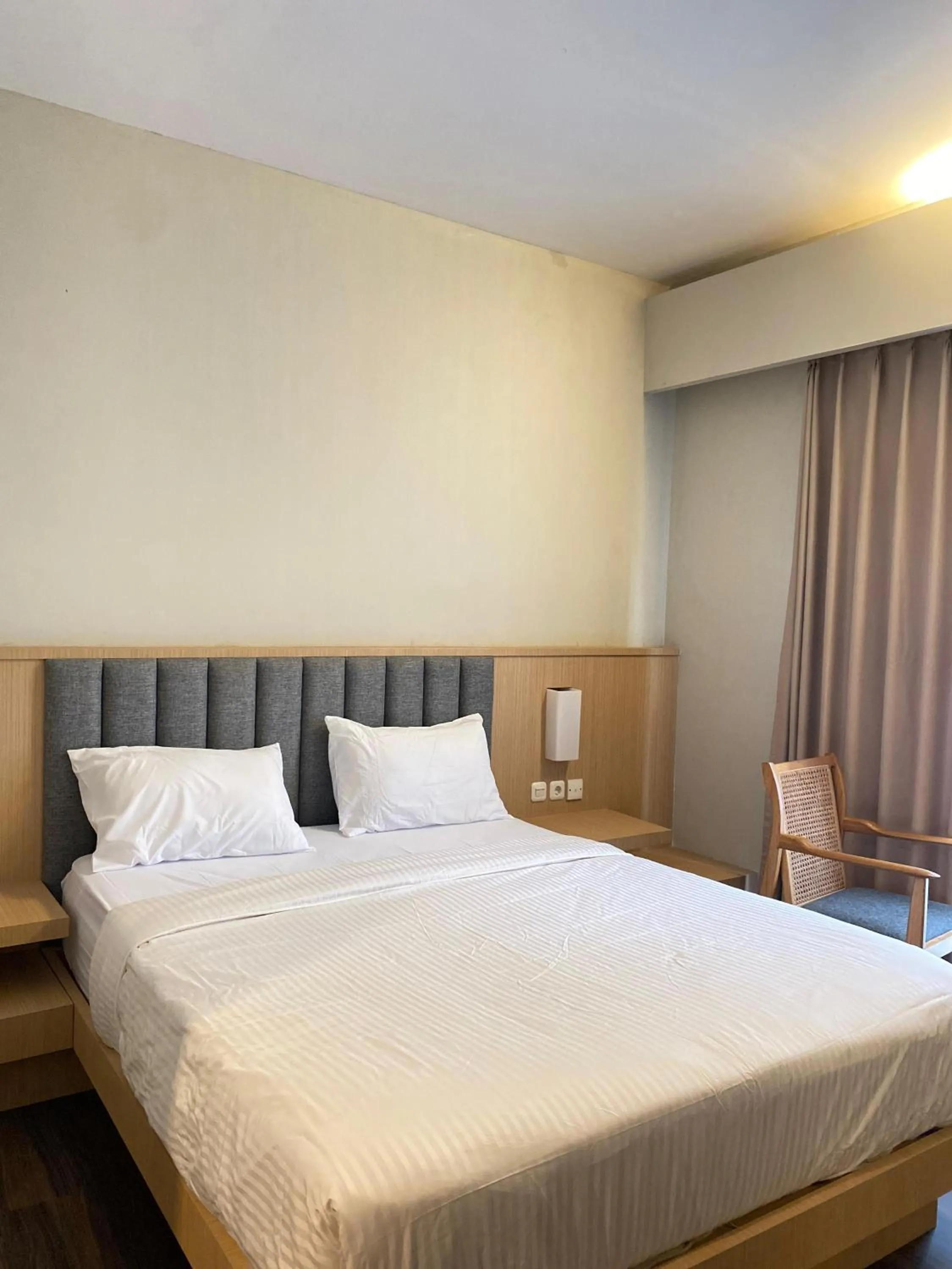 Bed in Regato Suites