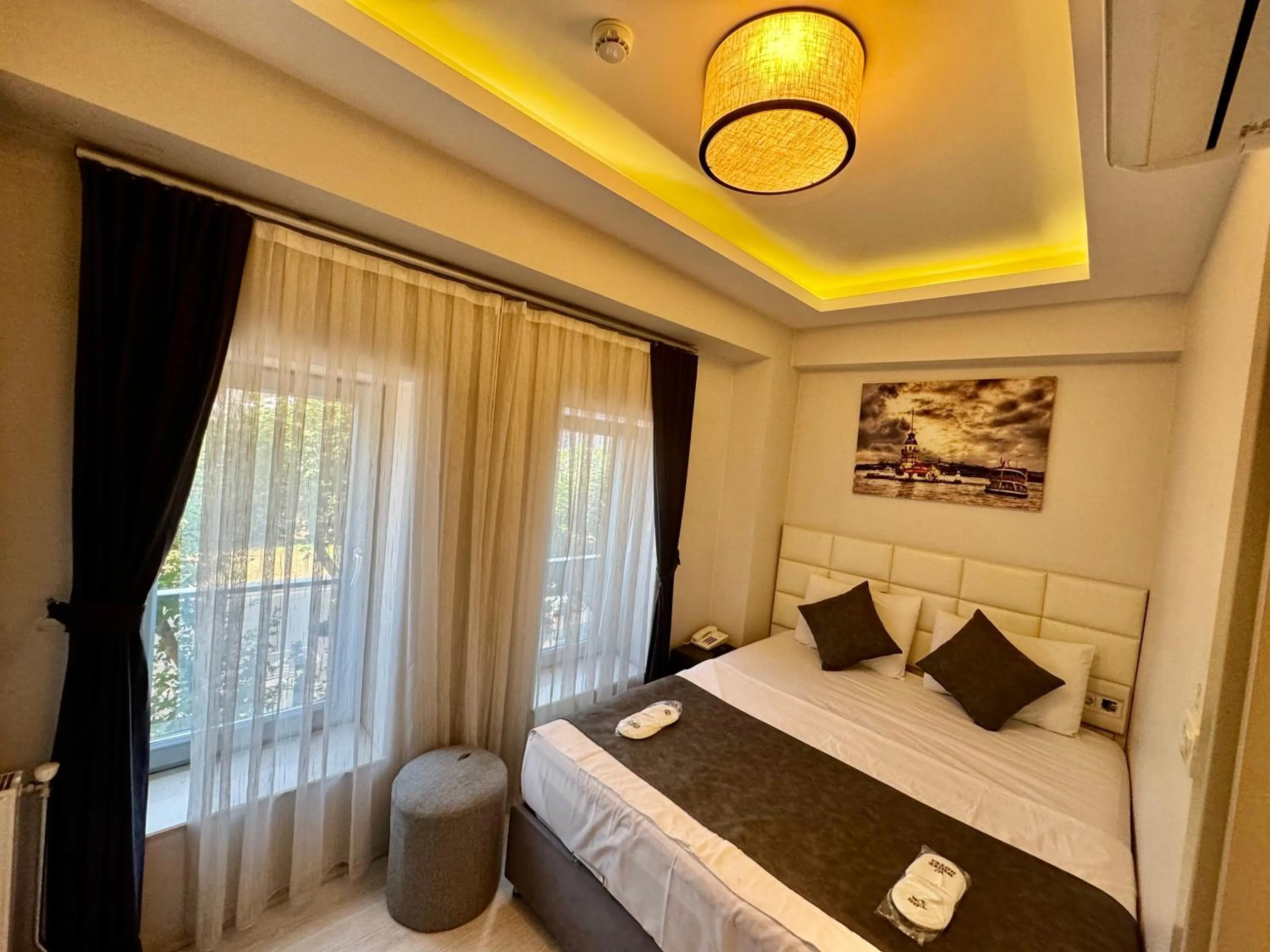 Bed in Aram Edessa Hotel