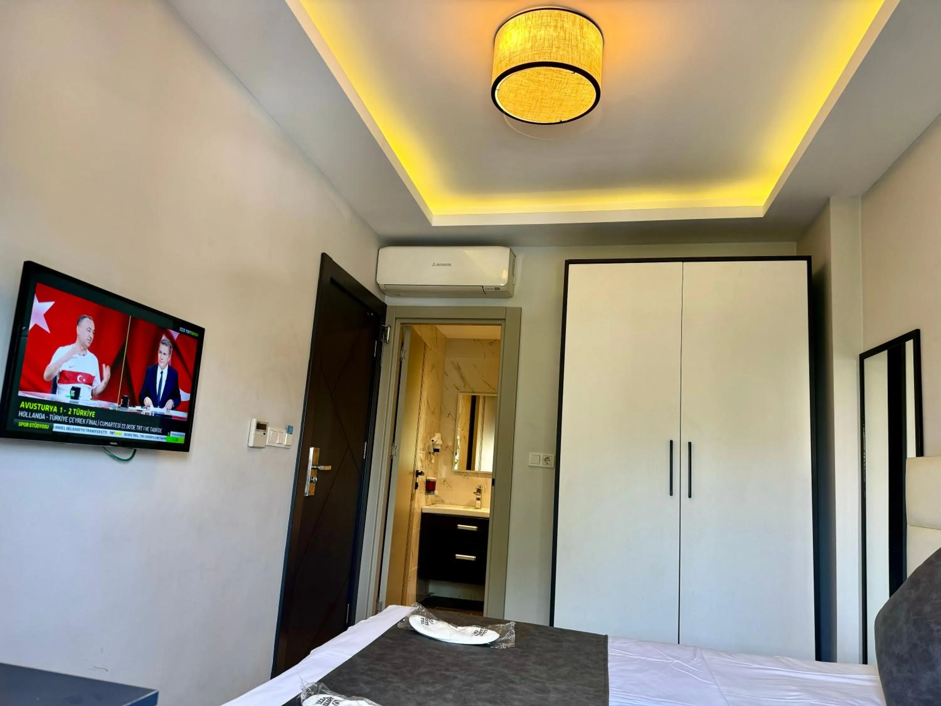 Bed in Aram Edessa Hotel