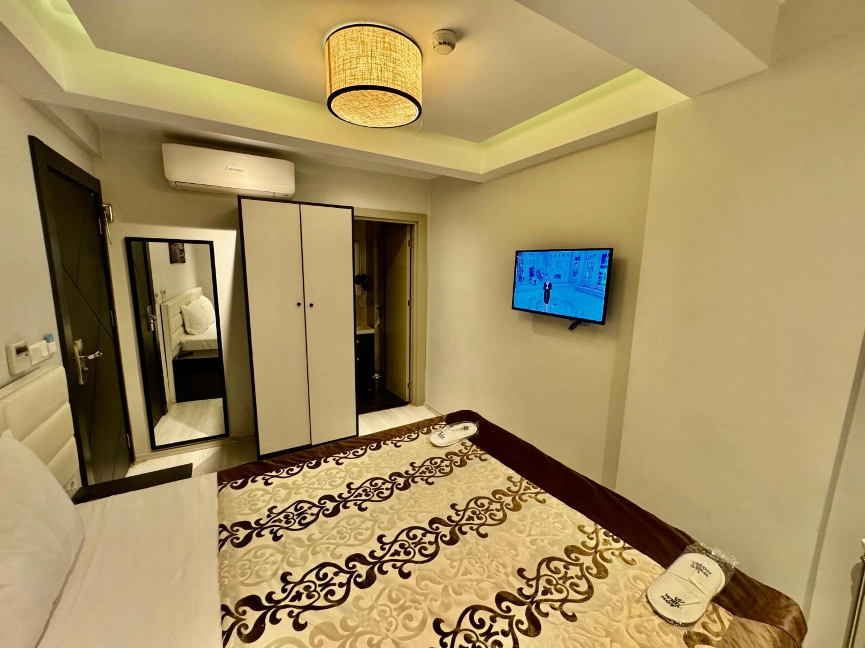 Bed in Aram Edessa Hotel