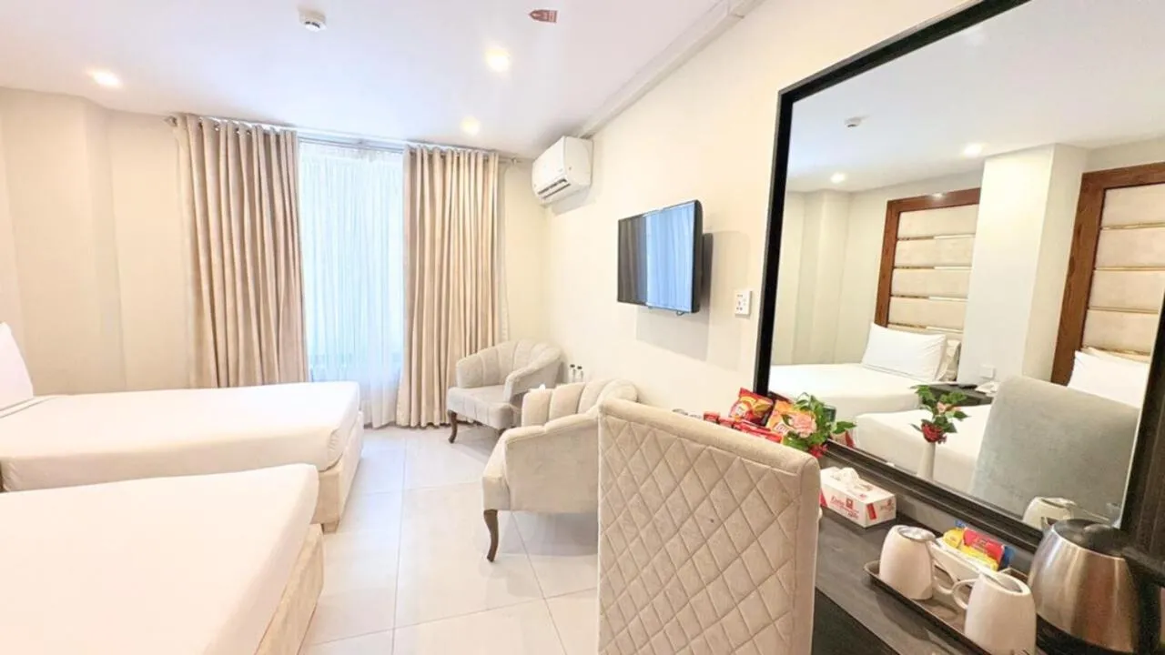 Seating area, Bed in Envoy Continental Hotel, Blue Area, Islamabad