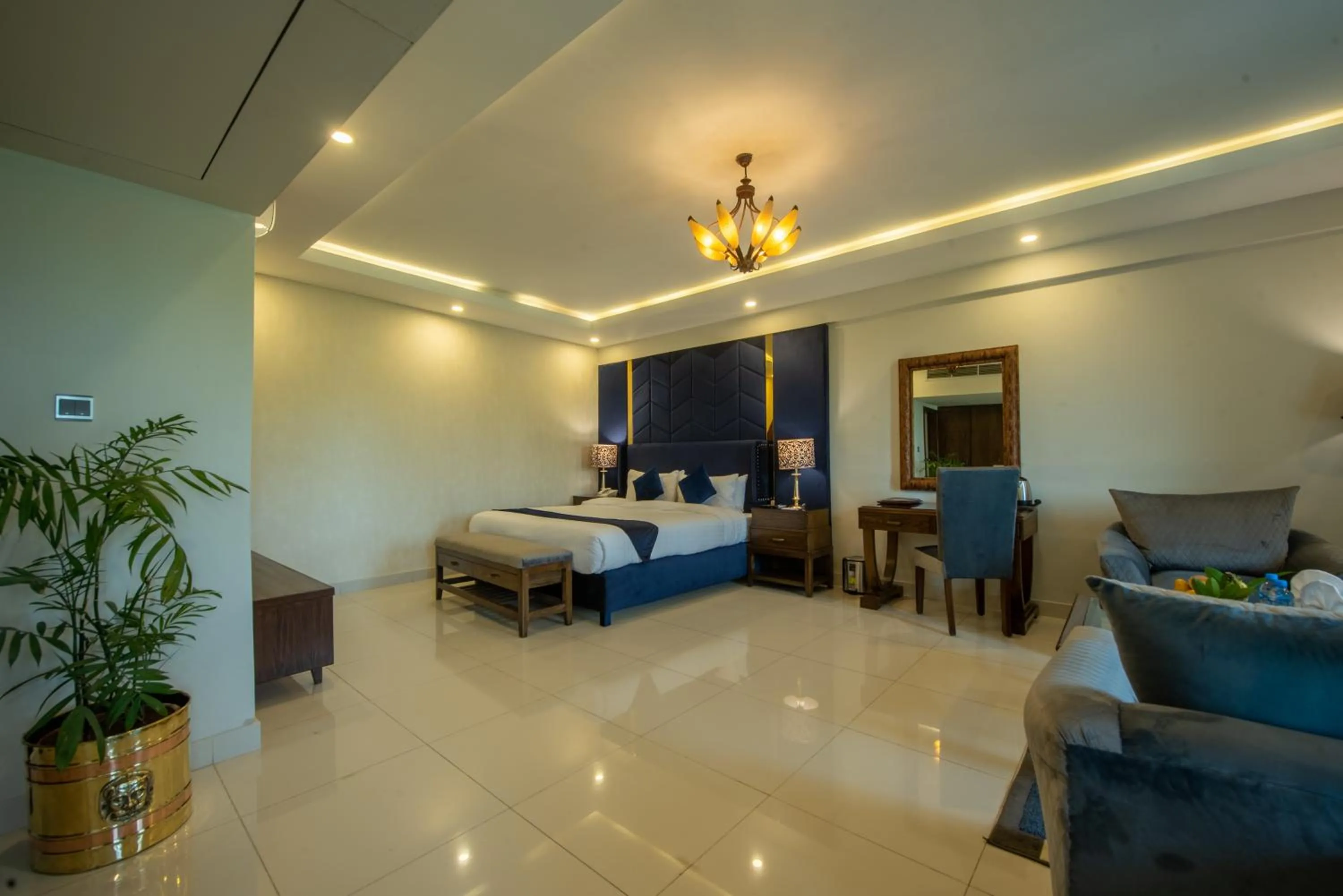 Photo of the whole room, Bed in Envoy Continental Hotel, Blue Area, Islamabad