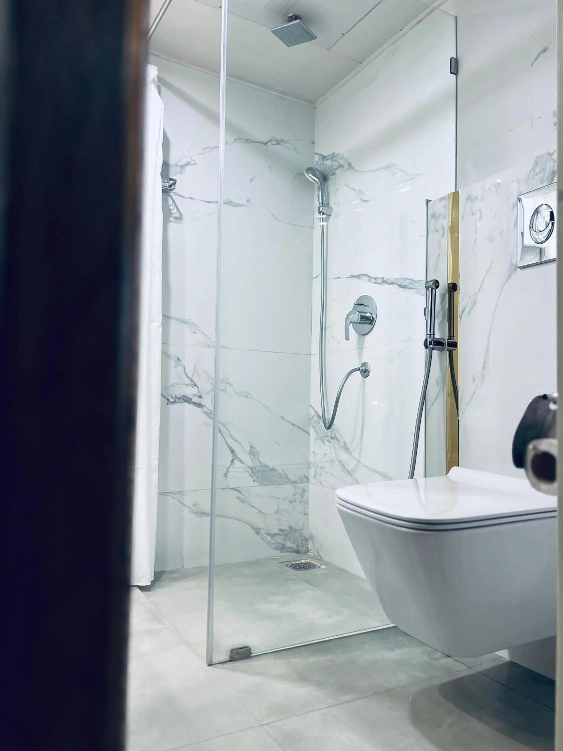 Shower in Envoy Continental Hotel, Blue Area, Islamabad