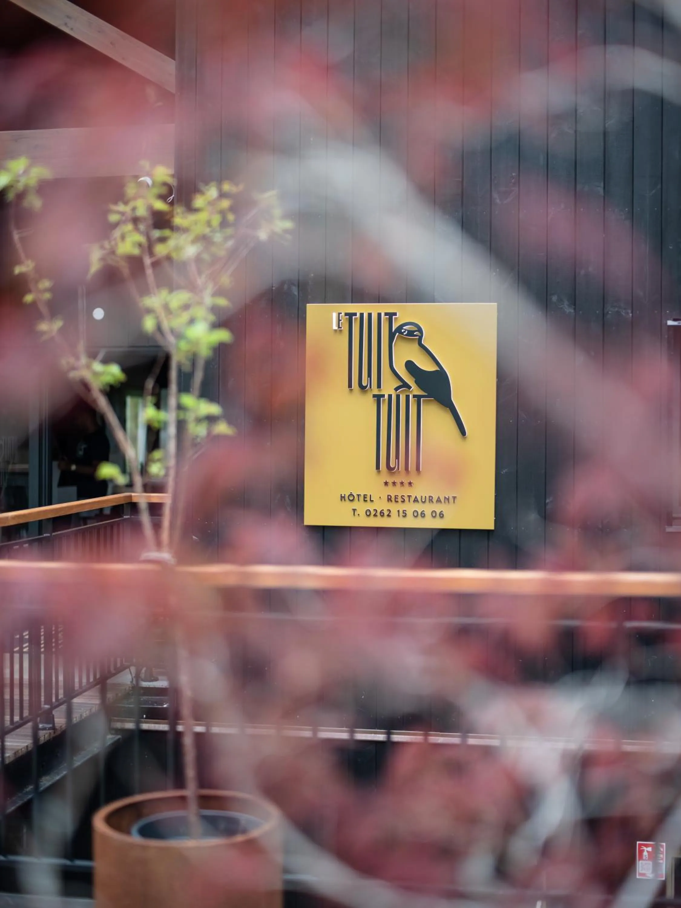 Property logo or sign in Hôtel le Tuit-Tuit