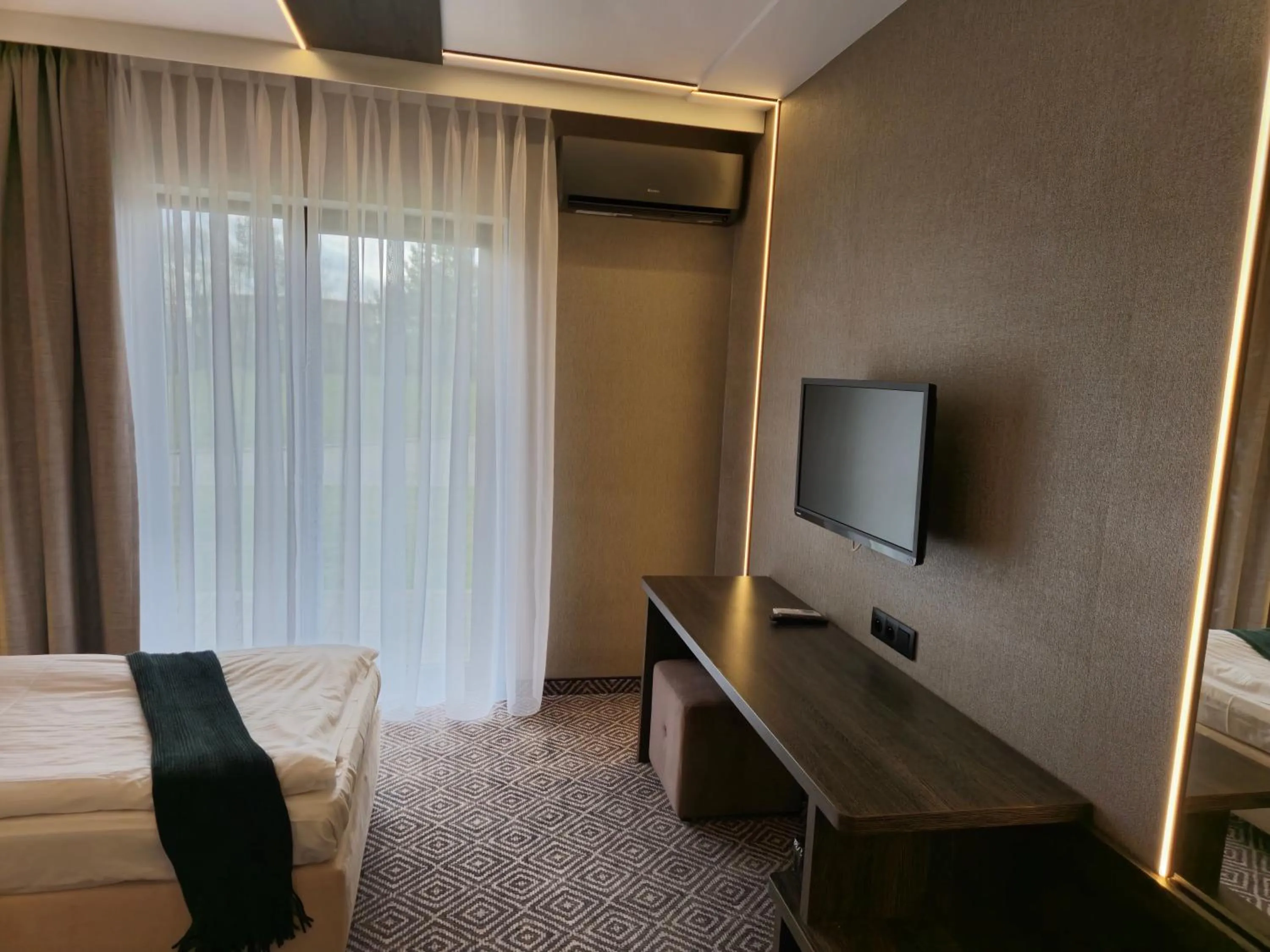 Photo of the whole room, Bed in Mikołajki Resort Hotel & Spa Jora Wielka