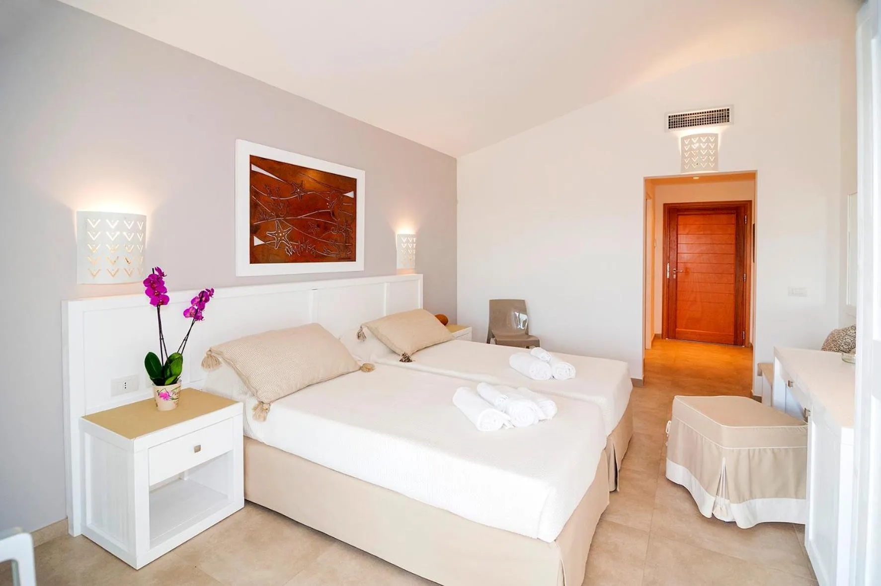 Bed in Stella Marina Budoni