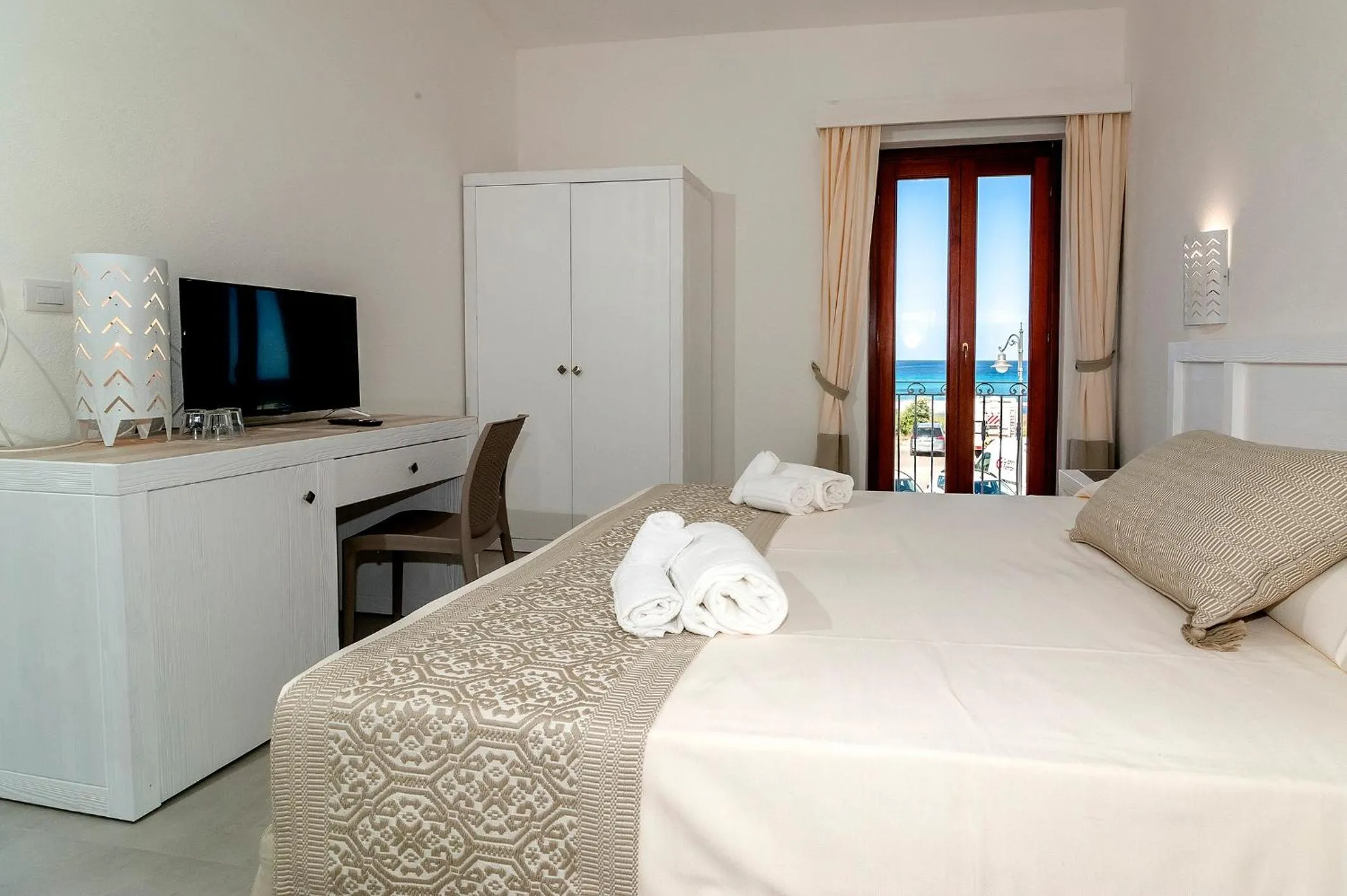 Bed in Stella Marina Budoni