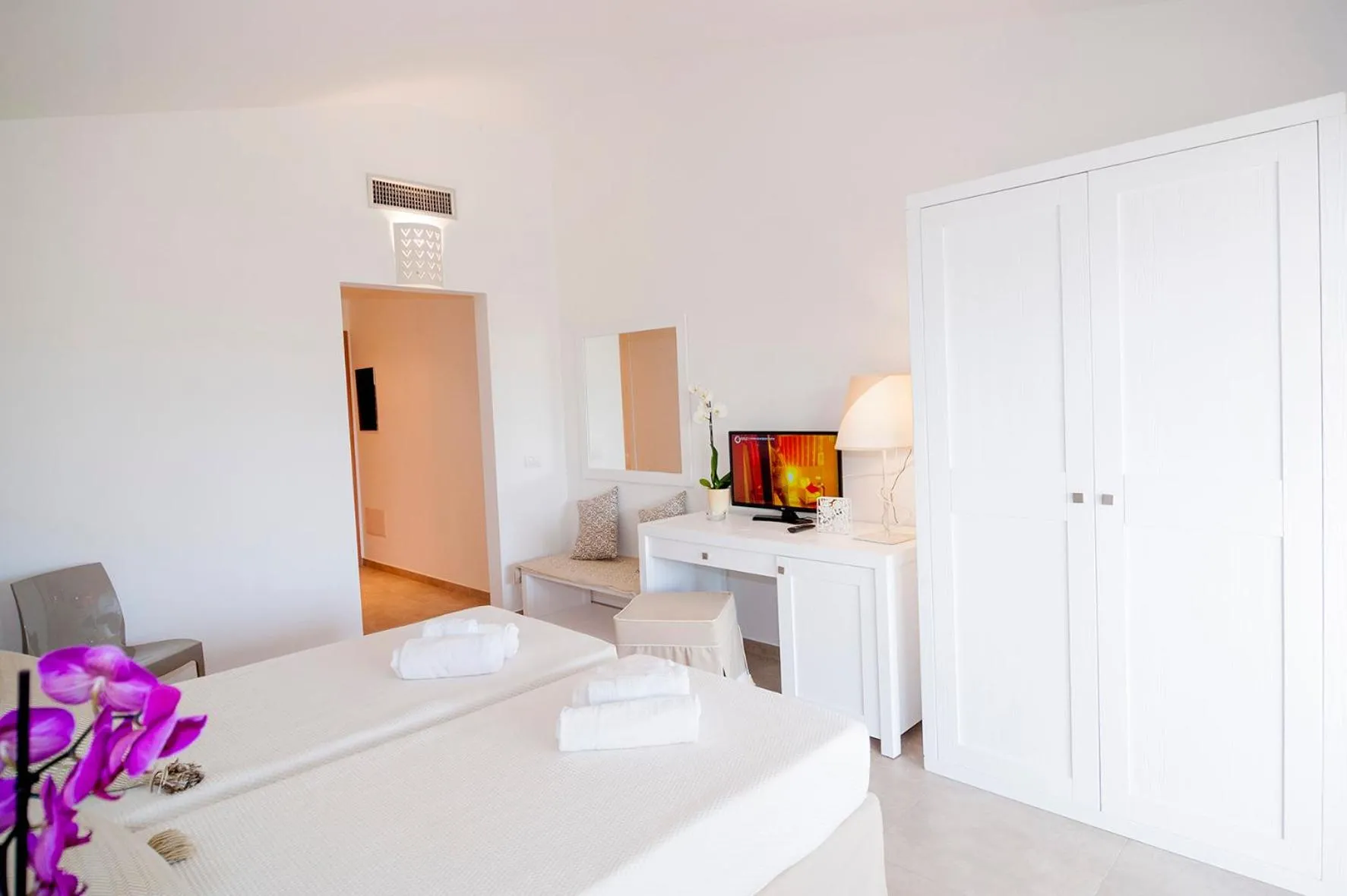 Bed in Stella Marina Budoni