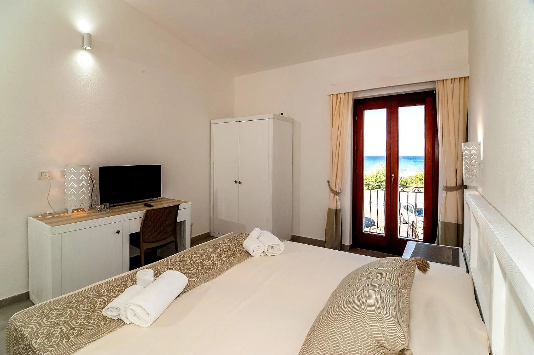 Bed in Stella Marina Budoni