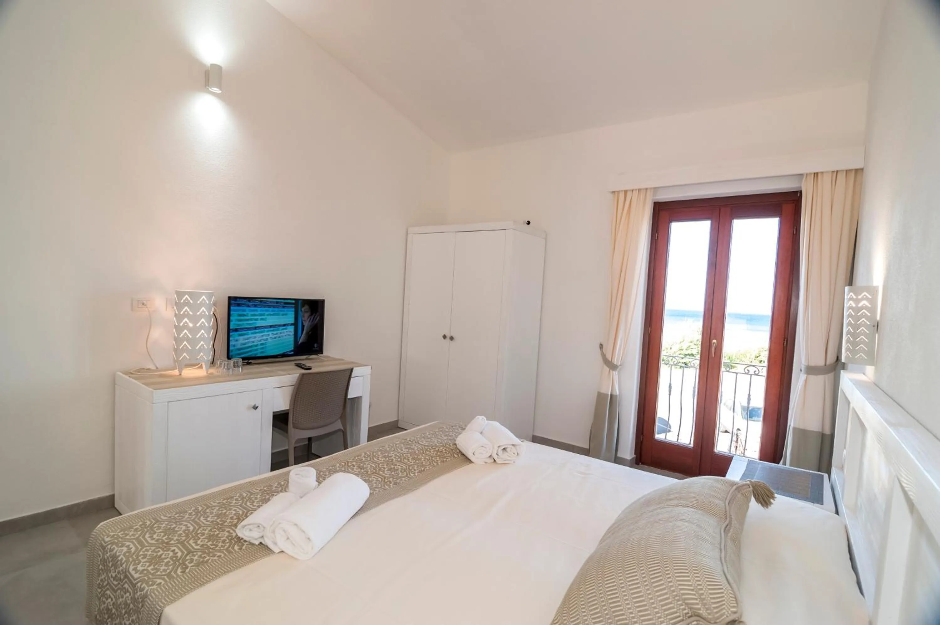 Bed in Stella Marina Budoni