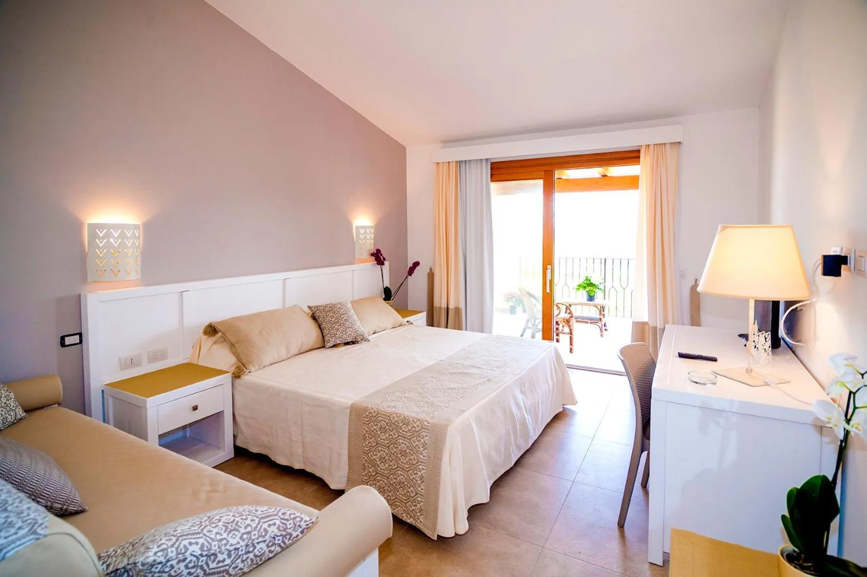 Bed in Stella Marina Budoni