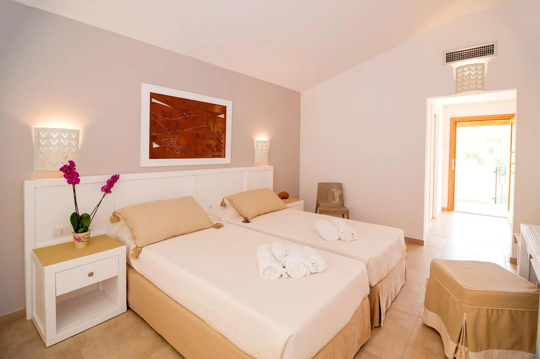 Bed in Stella Marina Budoni