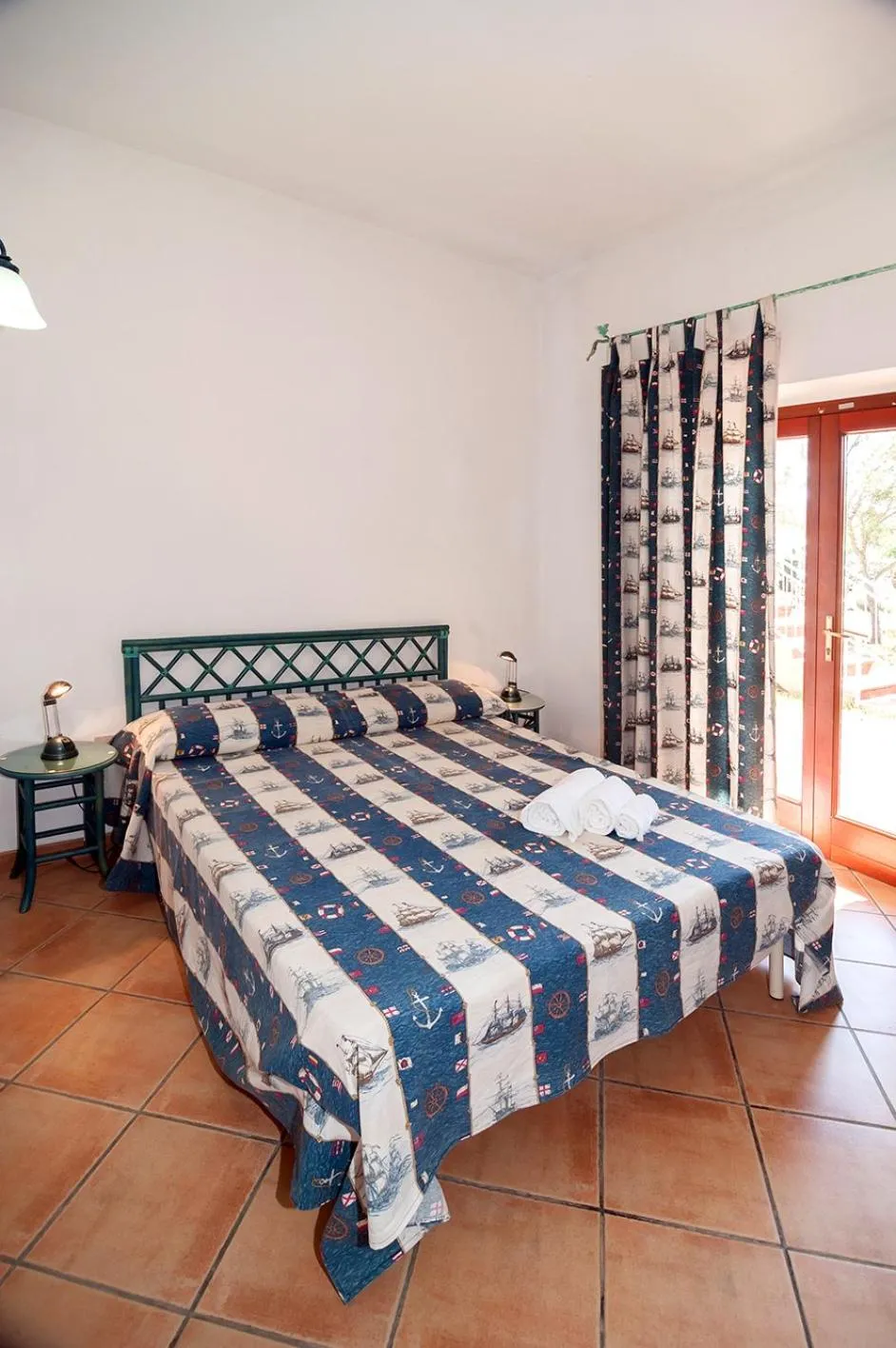 Bed in Stella Marina Budoni