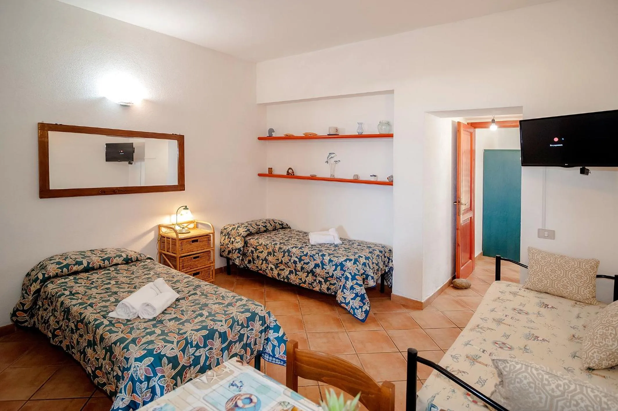 Bed in Stella Marina Budoni