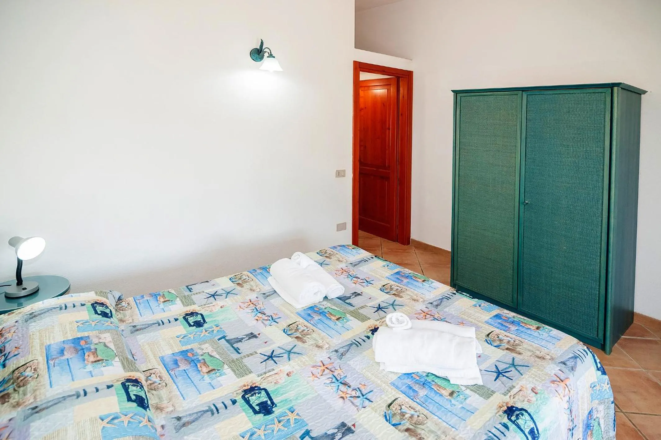 Bed in Stella Marina Budoni