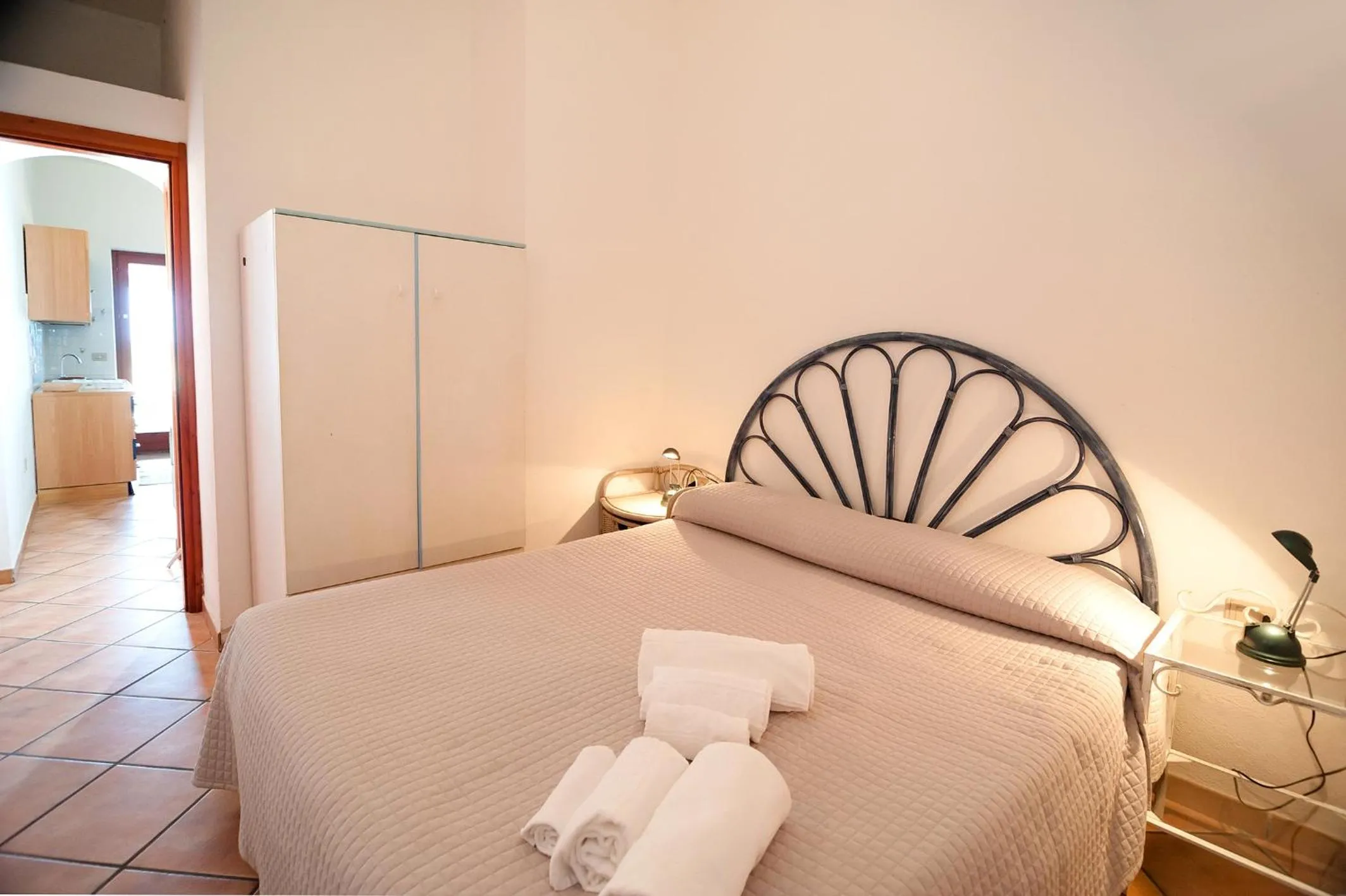 Bed in Stella Marina Budoni