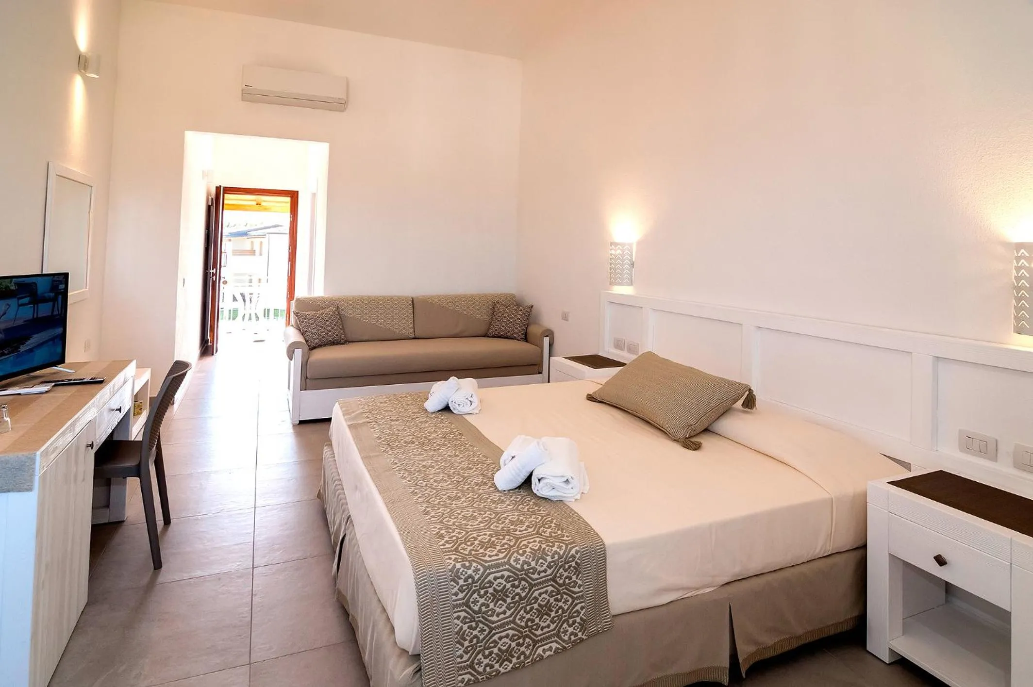 Bed in Stella Marina Budoni