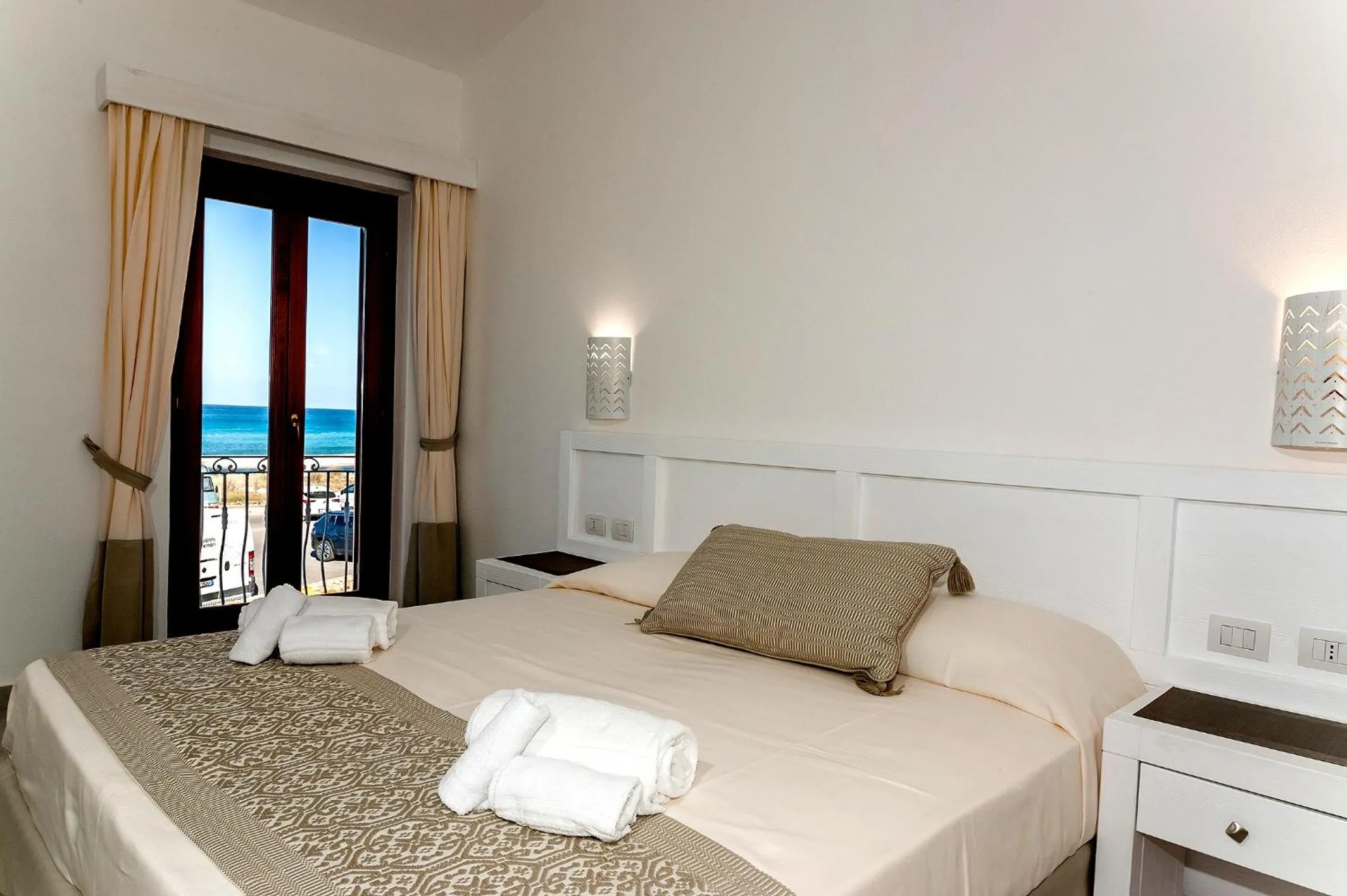 Bed in Stella Marina Budoni
