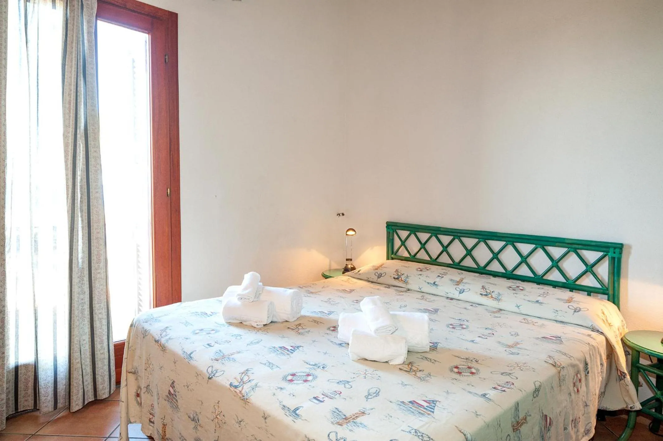Bed in Stella Marina Budoni