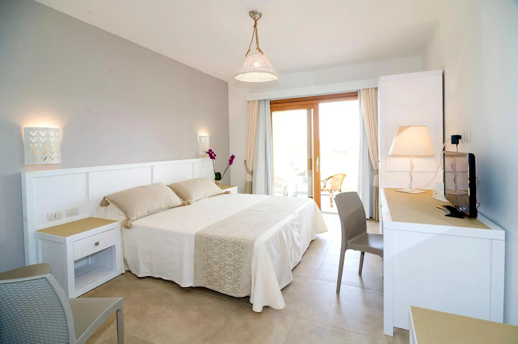 Bed in Stella Marina Budoni