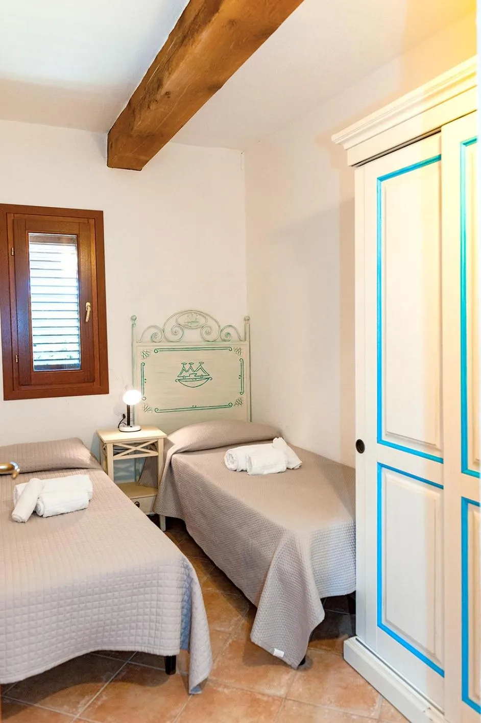 Bed in Stella Marina Budoni