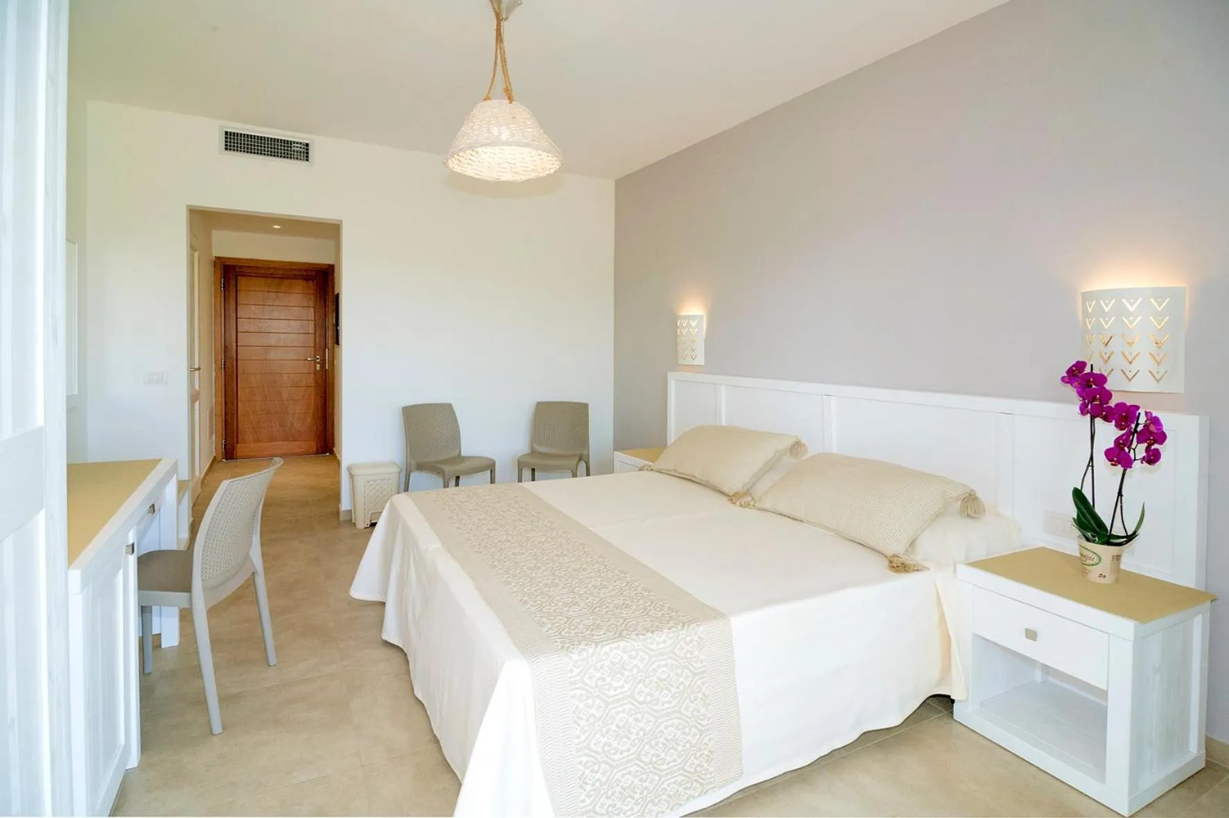 Bed in Stella Marina Budoni