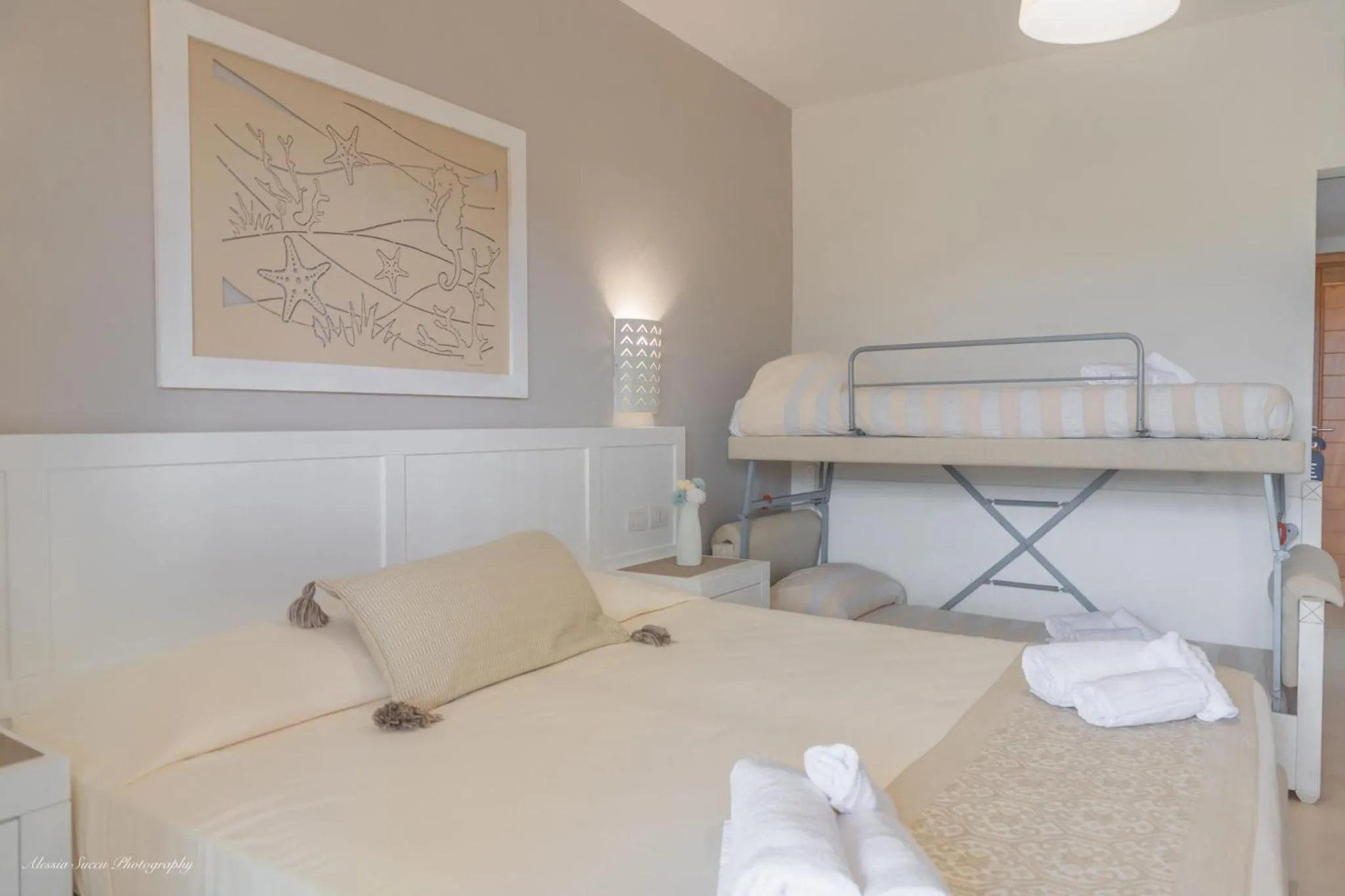 Bed in Stella Marina Budoni