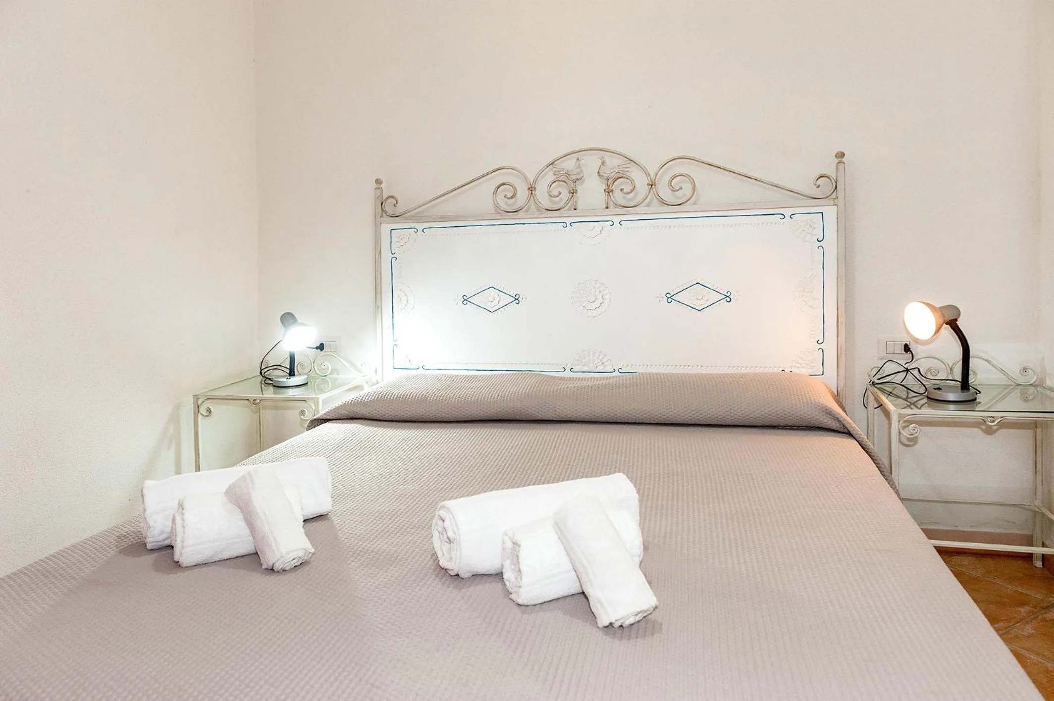 Bed in Stella Marina Budoni