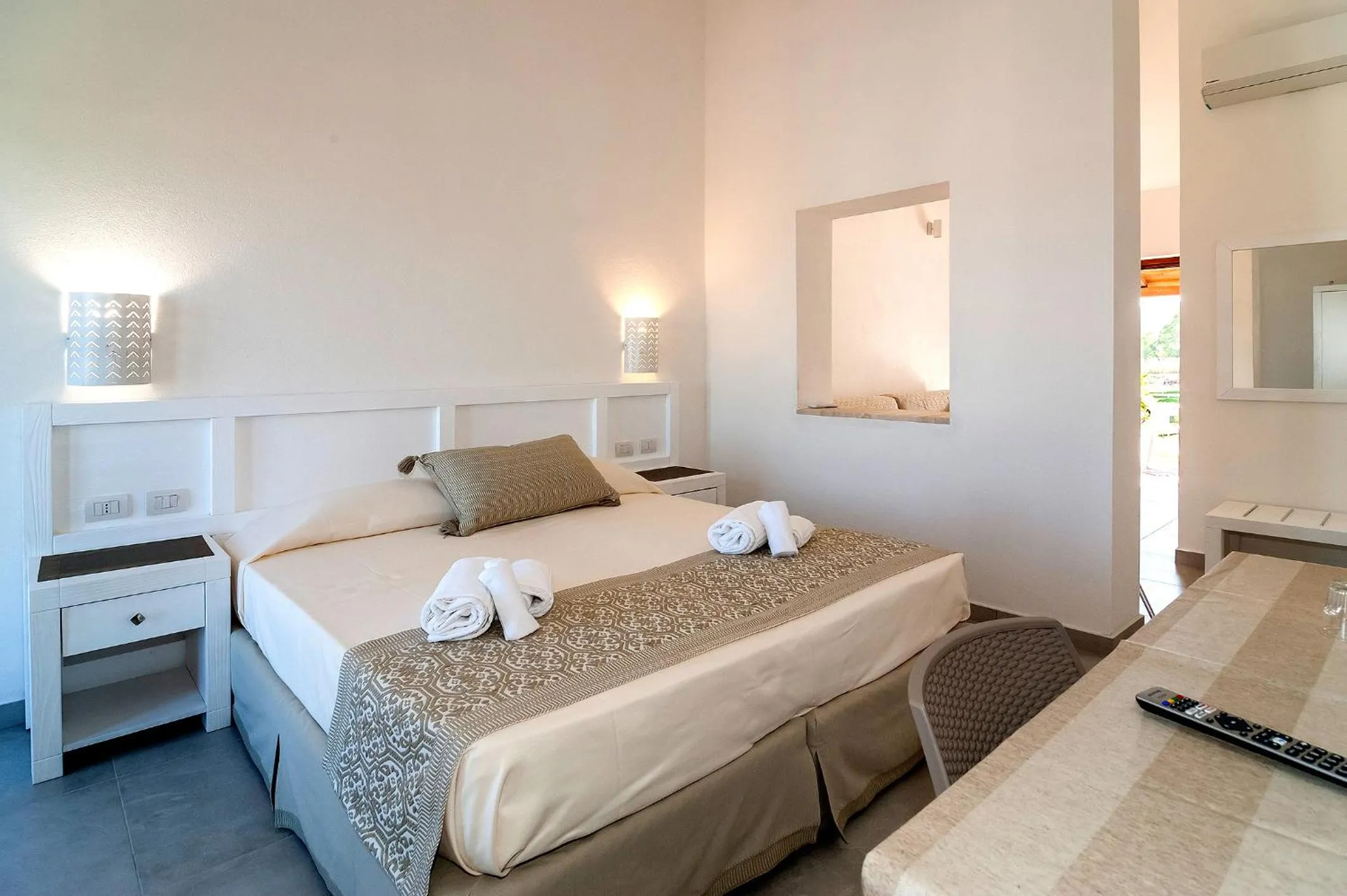Bed in Stella Marina Budoni