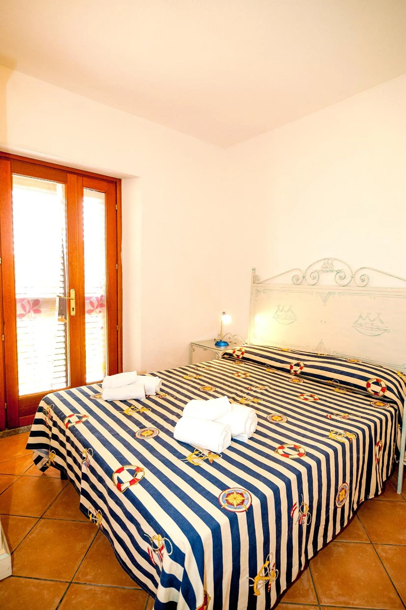 Bed in Stella Marina Budoni