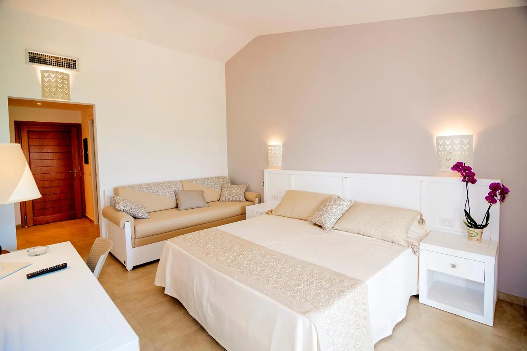 Bed in Stella Marina Budoni