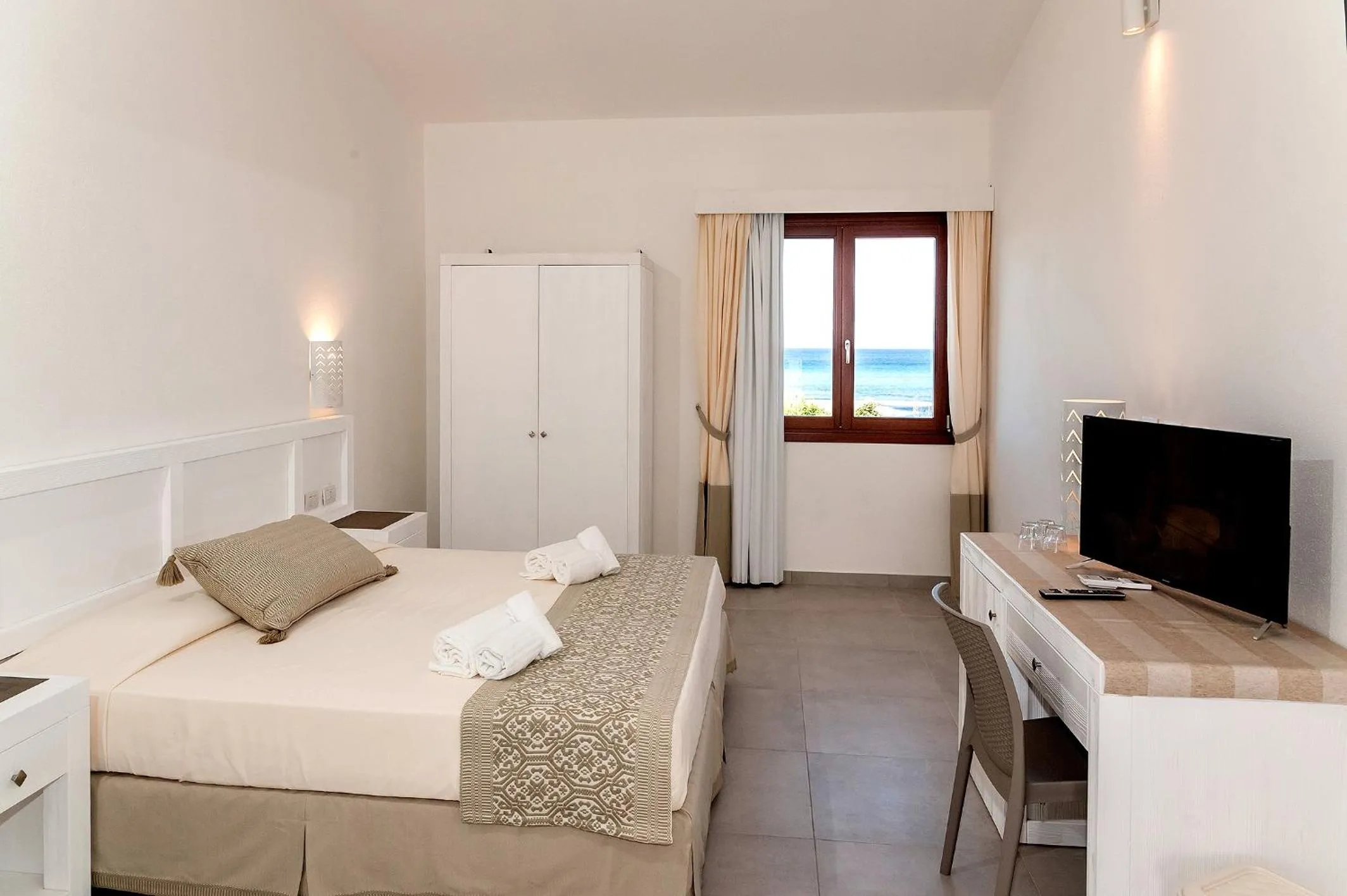 Bed in Stella Marina Budoni