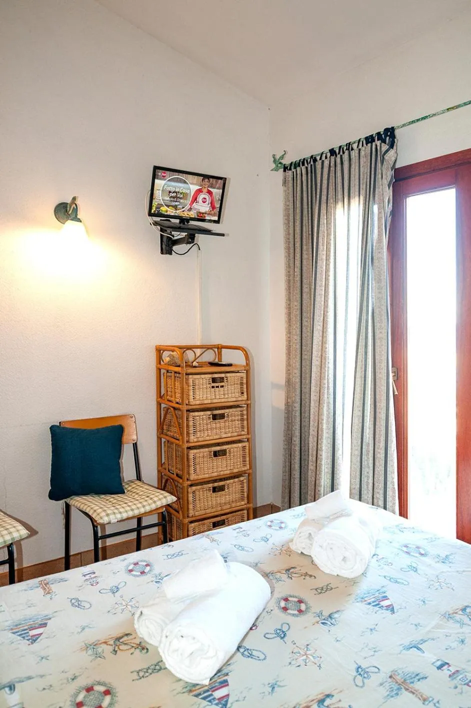 Bed in Stella Marina Budoni