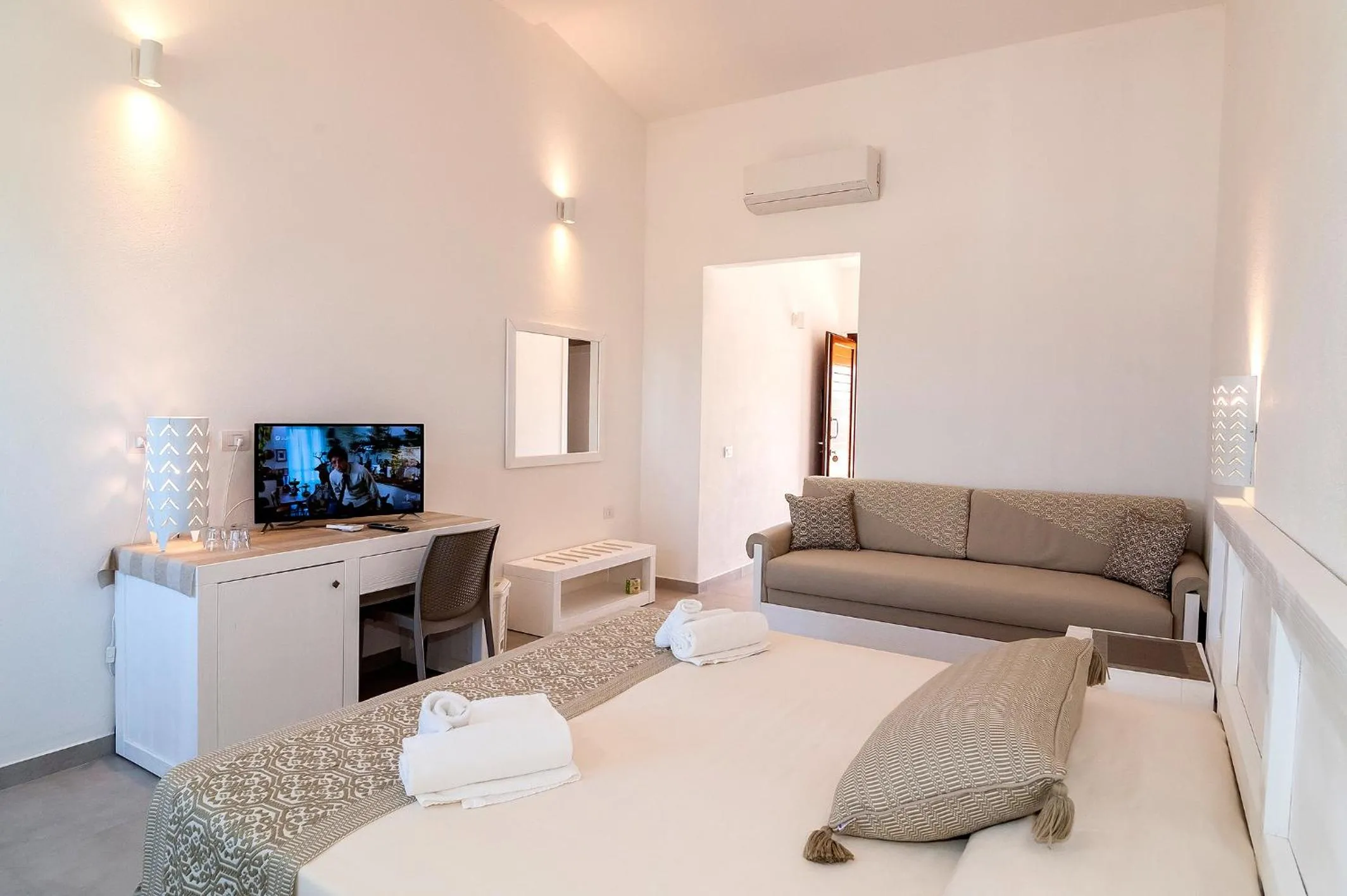 Bed in Stella Marina Budoni