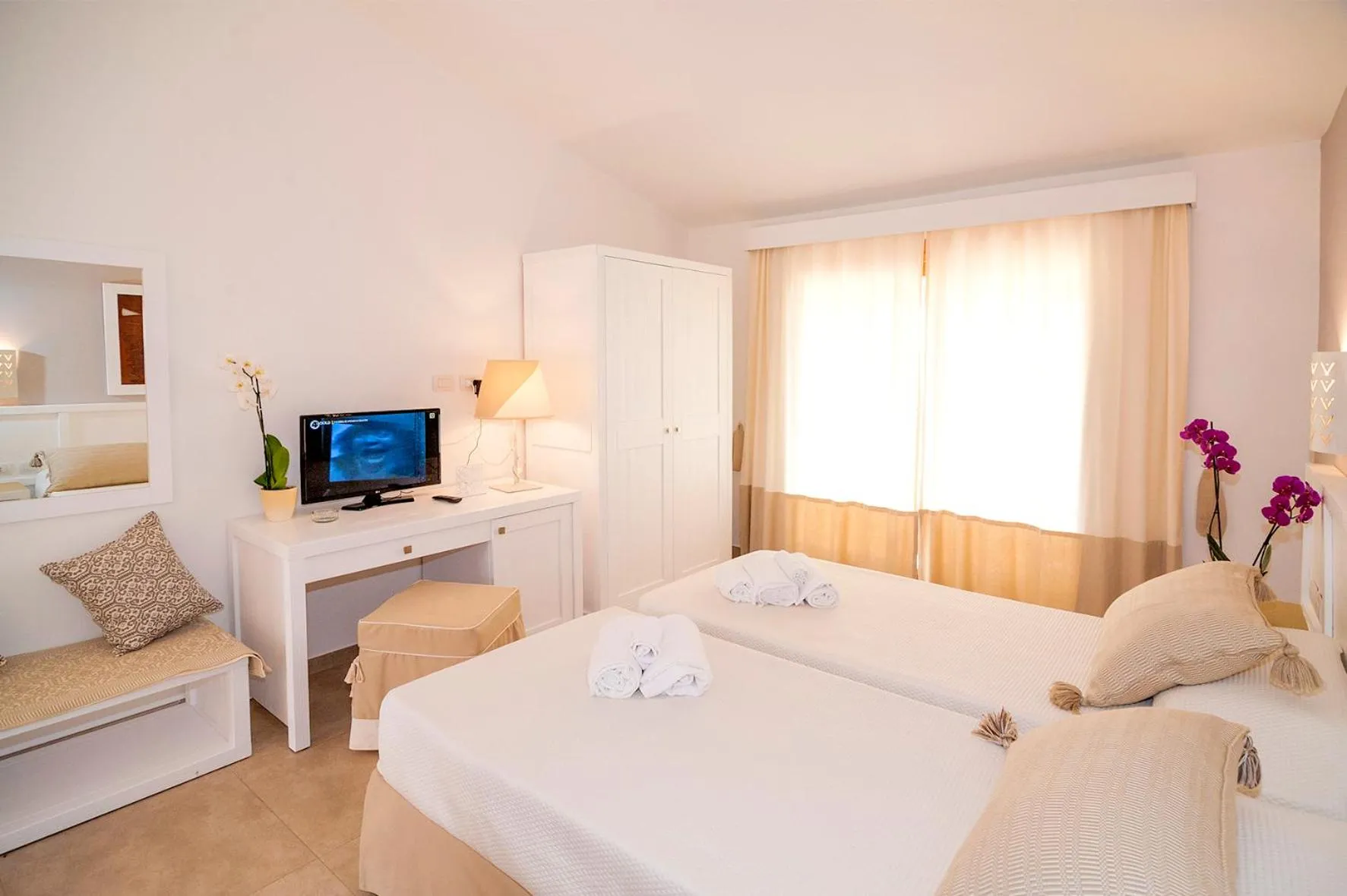 Bed in Stella Marina Budoni