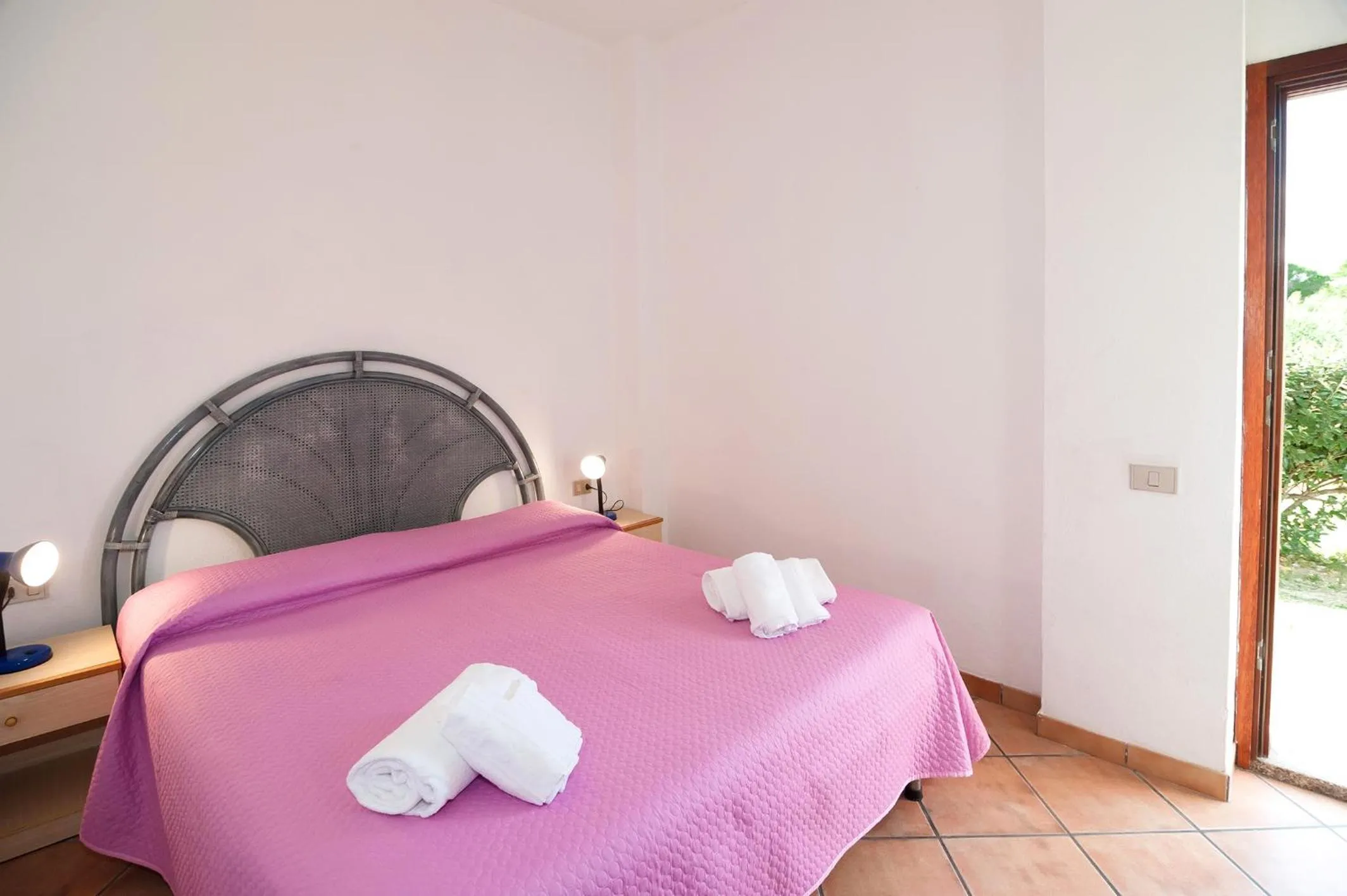Bed in Stella Marina Budoni