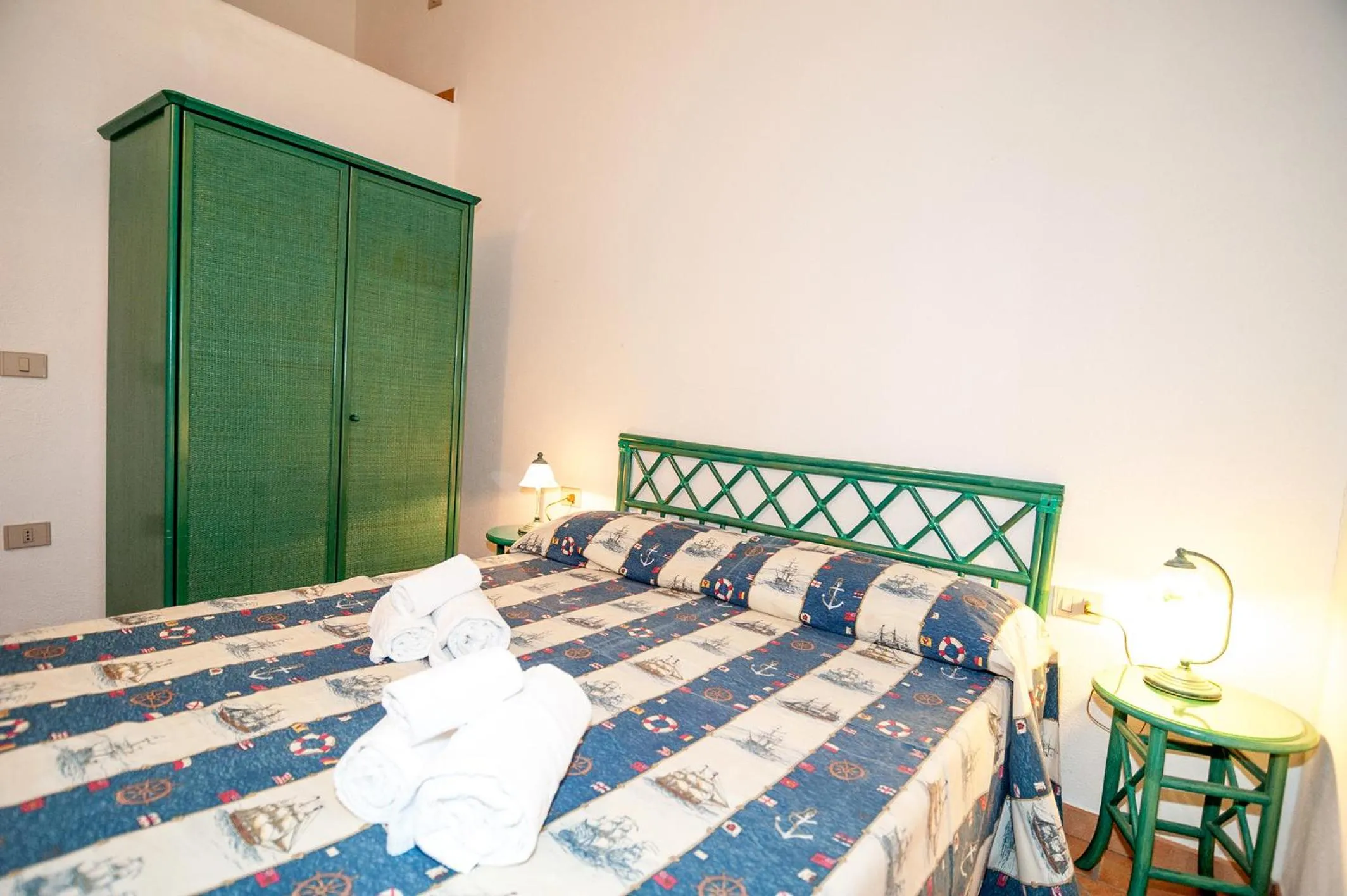 Bed in Stella Marina Budoni