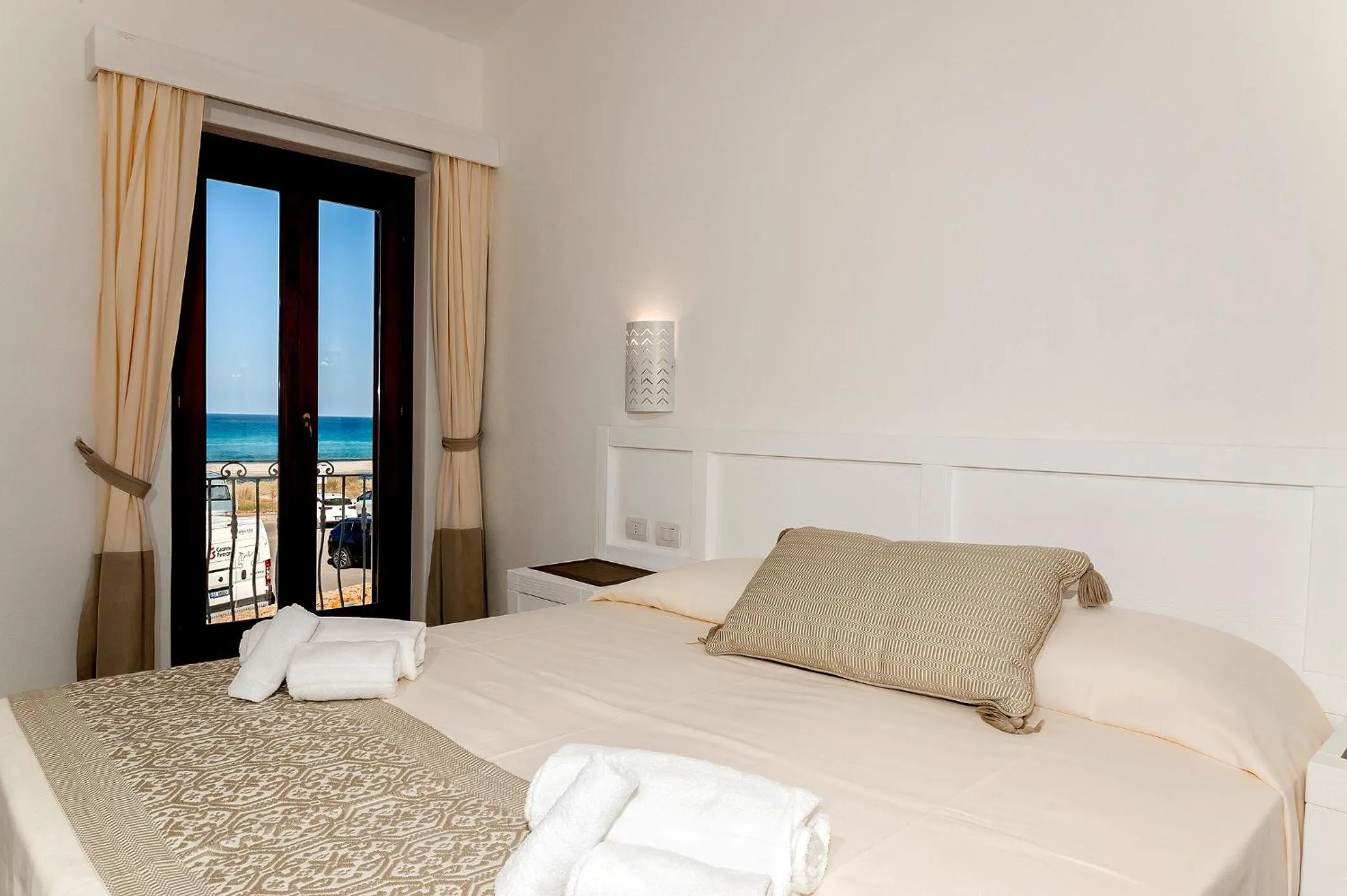 Bed in Stella Marina Budoni