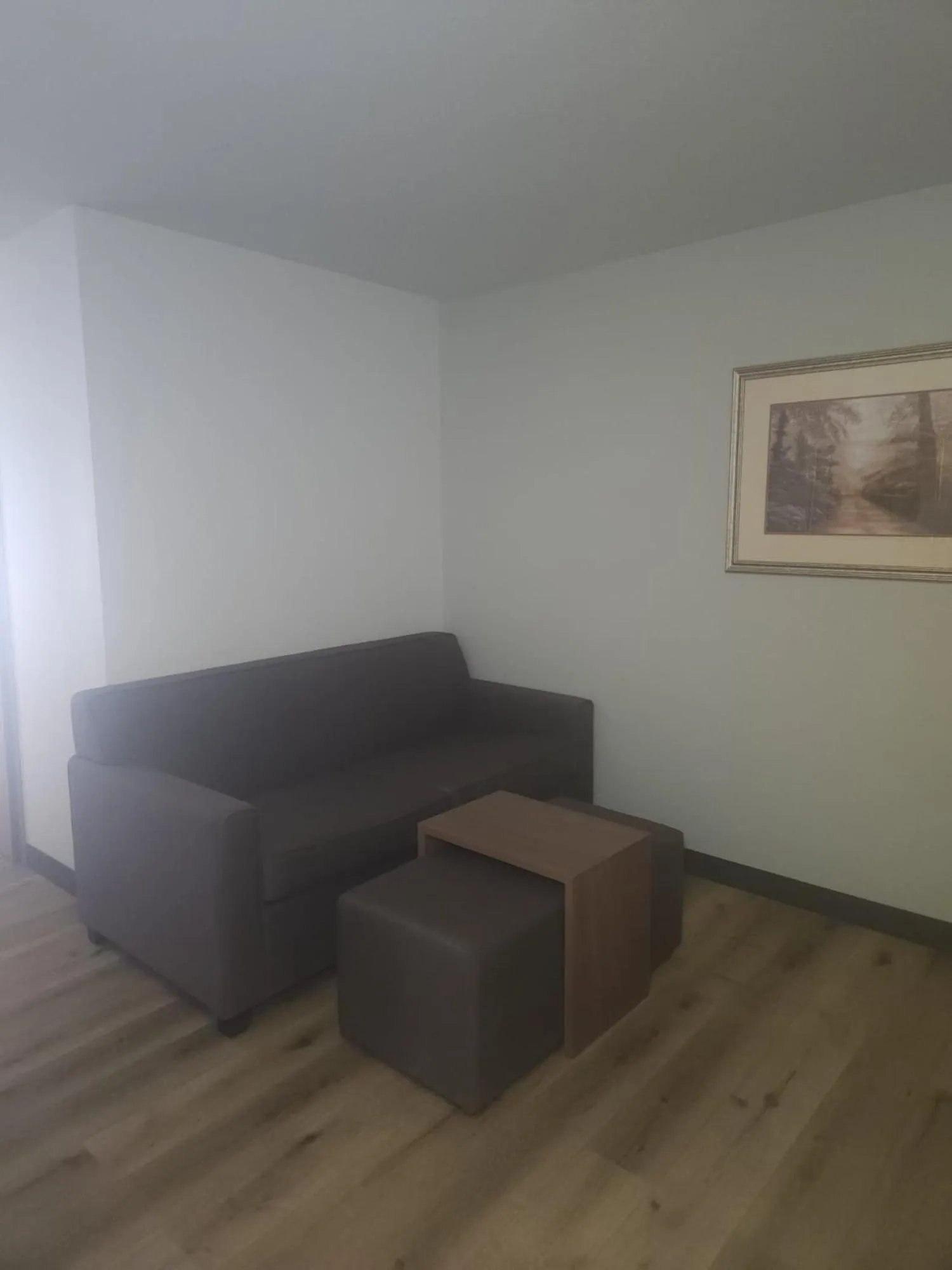 Living room in Wingate by Wyndham Youngstown - Austintown