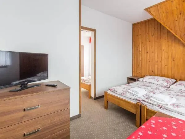 Bed in Pokoje gościnne u Komperdow pod wyciągiem narciarskim Kaniowka