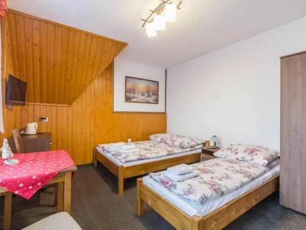 Bed in Pokoje gościnne u Komperdow pod wyciągiem narciarskim Kaniowka