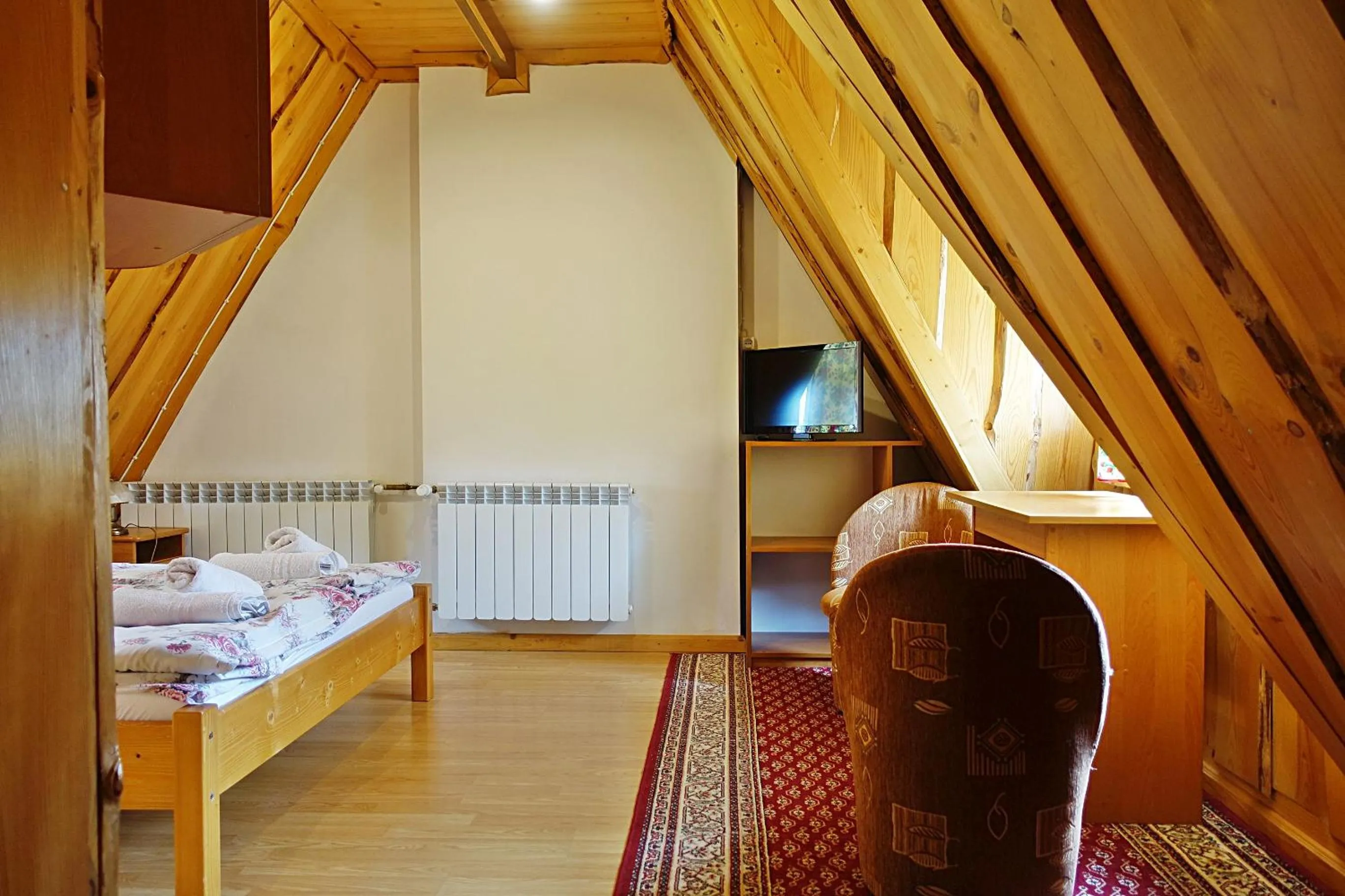 Bed in Pokoje gościnne u Komperdow pod wyciągiem narciarskim Kaniowka