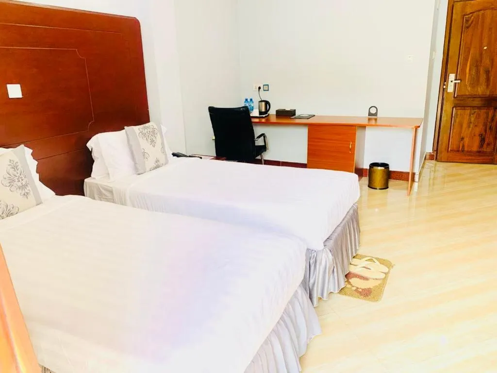 Bedroom, Bed in Green Mountain Hotel